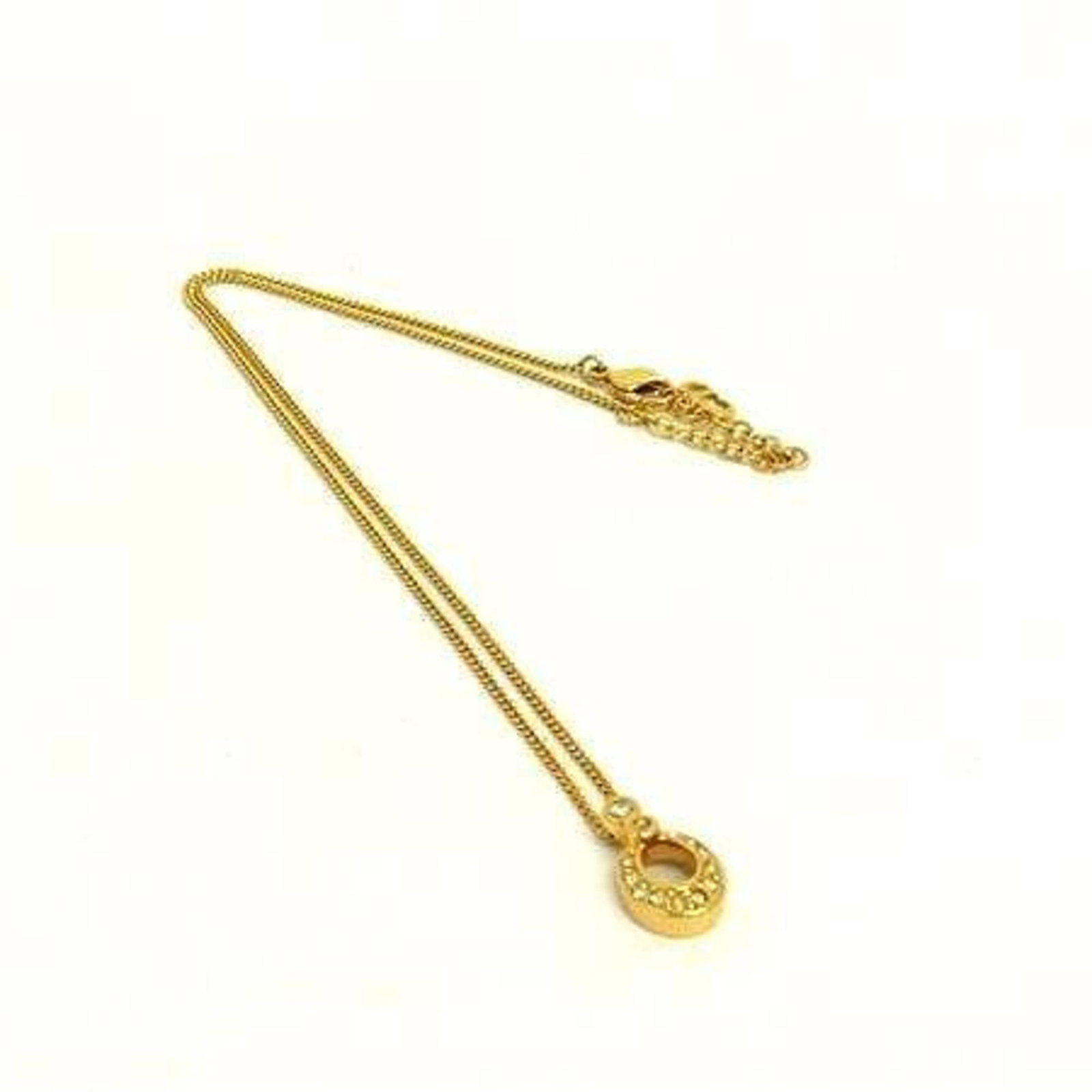 Christian Dior Necklace - Gold Metal Rhinestones for Women: Christian Dior Necklace - Gold Metal Rhinestones for Women Gold Metal Rhinestones adorn this Christian Dior necklace, adding a touch of luxury and glamour to any outfit. The pendant features a classic