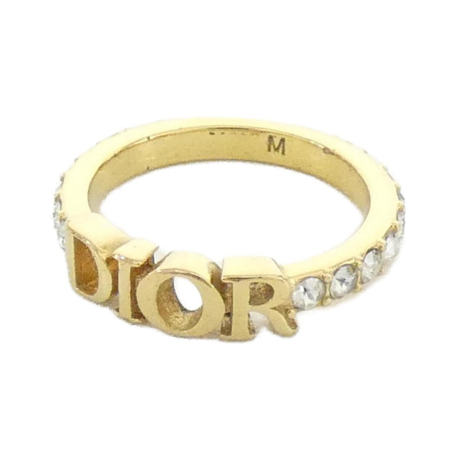 Christian Dior Band Ring: Christian Dior Band Ring Used Christian Dior Band Ring in clear color, featuring a few traces of usage with some scratches and dirt. The ring is in very good condition overall. A clear band from this