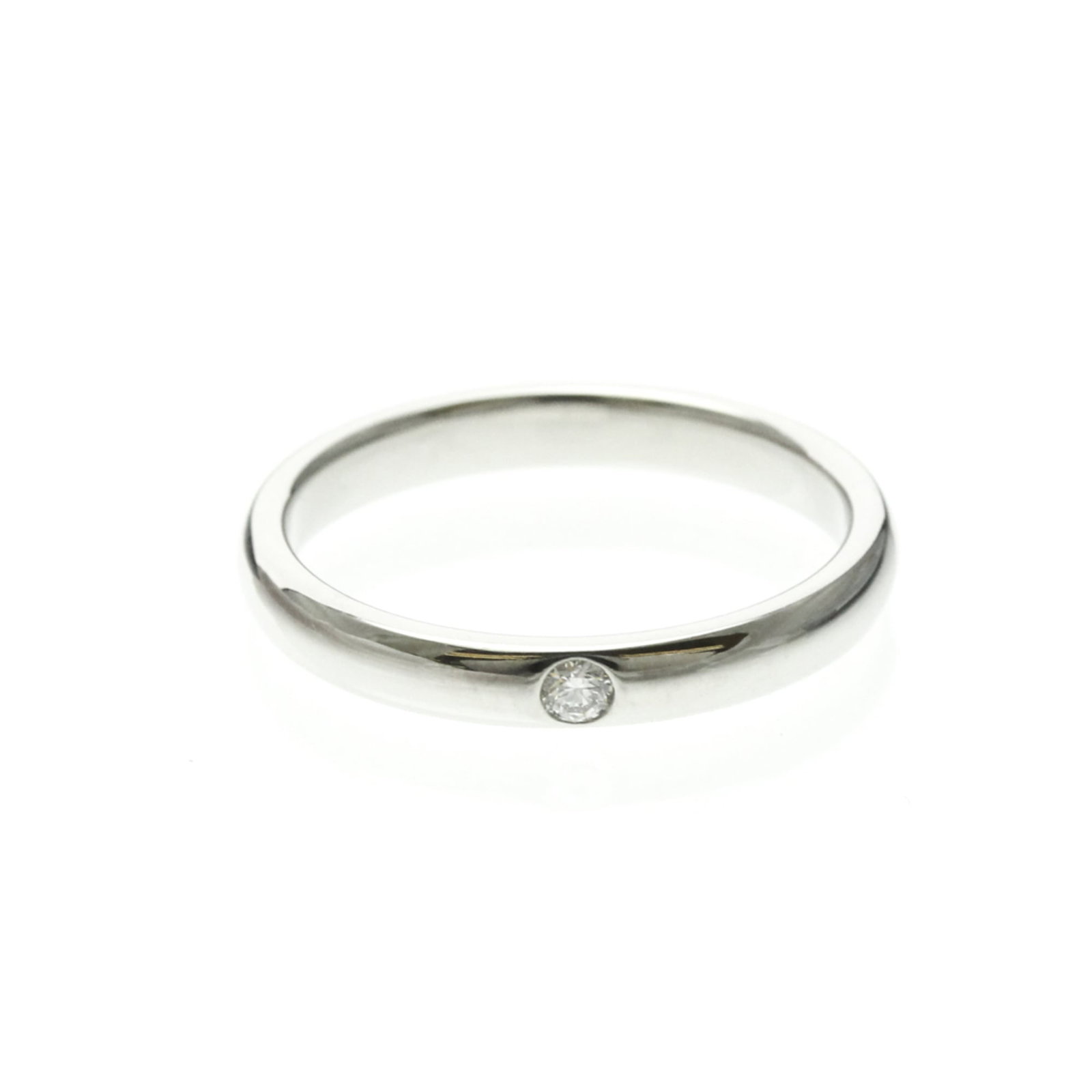 Harry Winston Band Ring Platinum: Harry Winston Band Ring Platinum Platinum band ring with a diamond stone from Harry Winston, featuring a sleek silver finish and a slim profile. The ring's 2.9mm width and 5.3g weight make it a