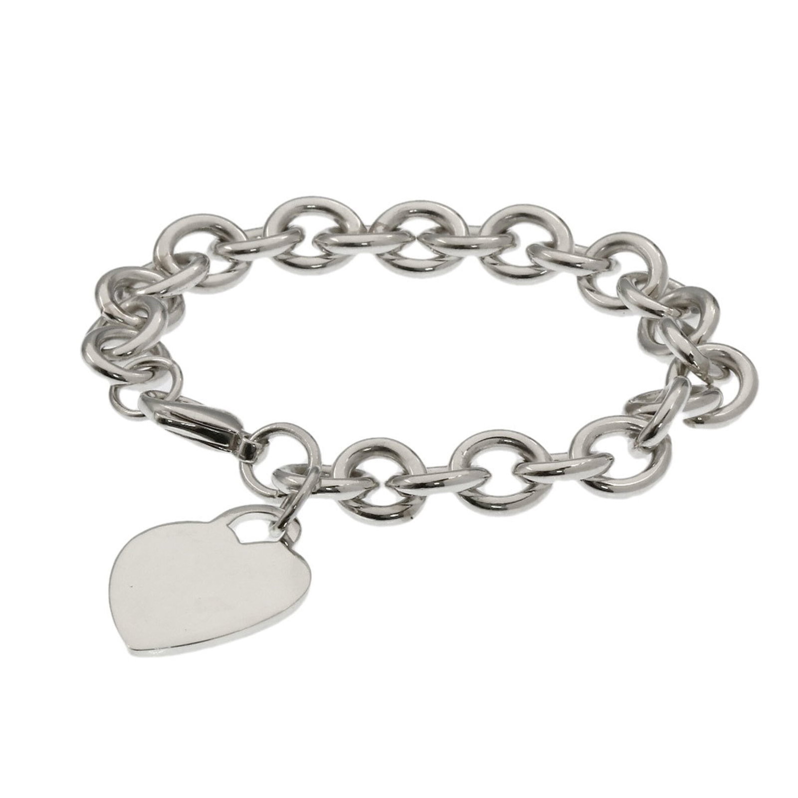 Tiffany Charm Bracelet Silver: Tiffany Charm Bracelet Silver This Tiffany charm bracelet features sterling silver construction and a classic design. With some minor signs of wear, such as scratches and dirt, this used charm
