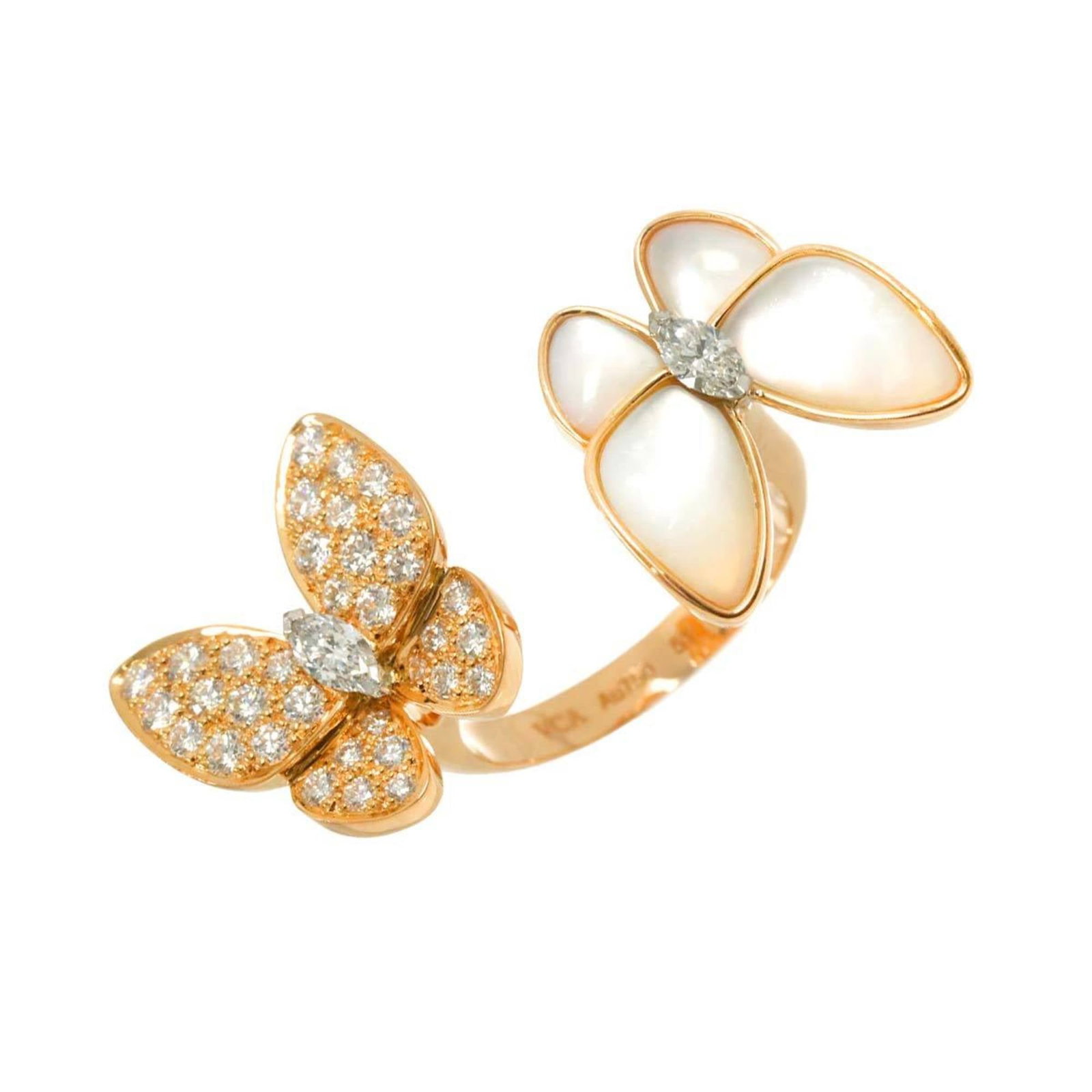 Van Cleef & Arpels Band Ring: Van Cleef & Arpels Band Ring The Van Cleef & Arpels Band Ring boasts an elegant simplicity with its 18K gold construction and delicate white metal band. A stunning diamond and shell combination adds
