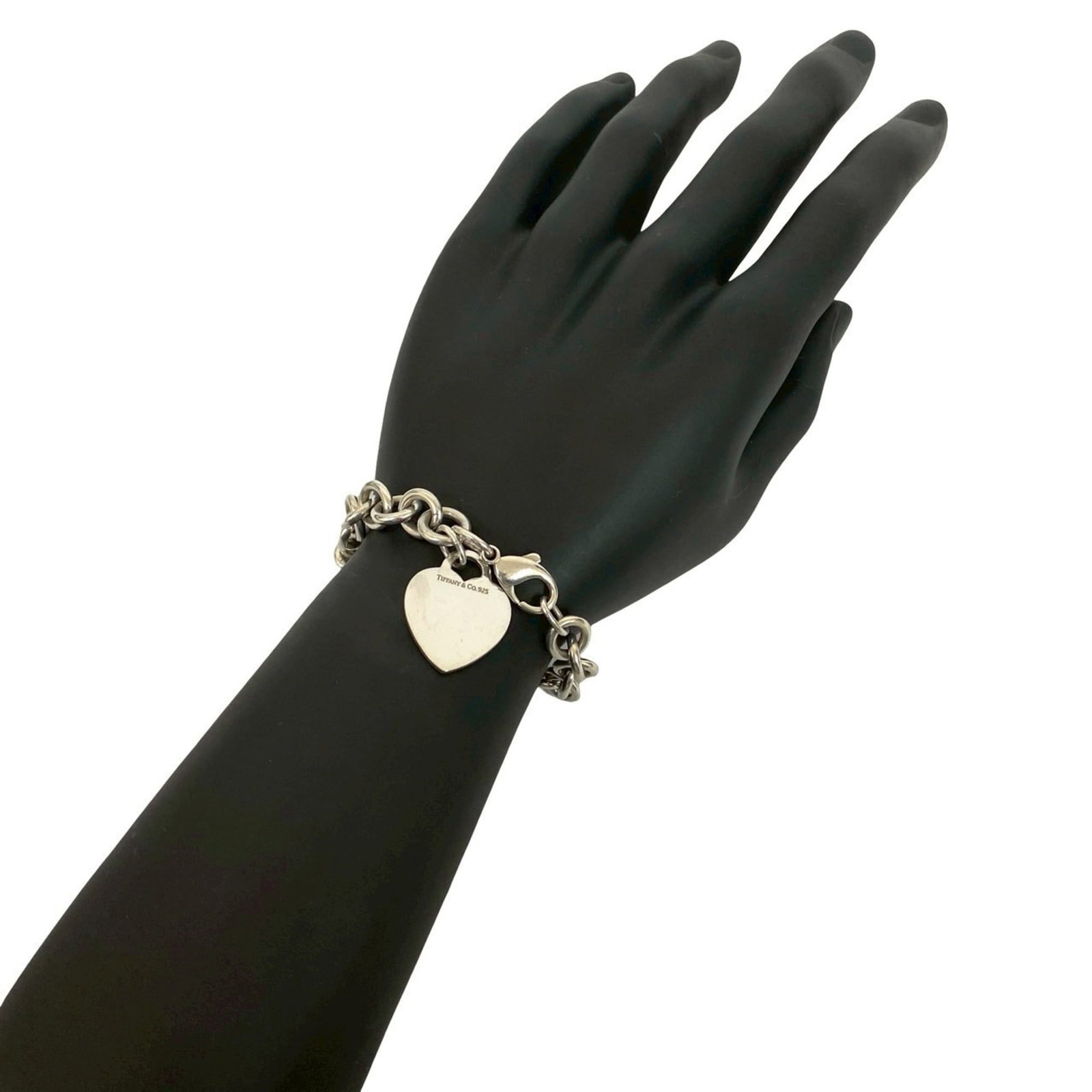 Tiffany Charm Bracelet Silver 925: Tiffany Charm Bracelet Silver 925 Silver 925 Tiffany Charm Bracelet with Traces of Usage. This 19.7cm charm bracelet features a silver 925 material and has visible scratches / dirt from previous use. 