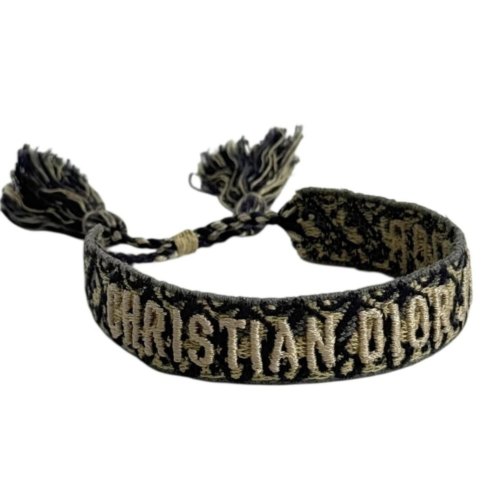 Christian Dior Charm Bracelet: Christian Dior Charm Bracelet Christian Dior Charm Bracelet. This used charm bracelet features a classic design with a few traces of usage, some scratches and dirt visible, yet overall in very good co