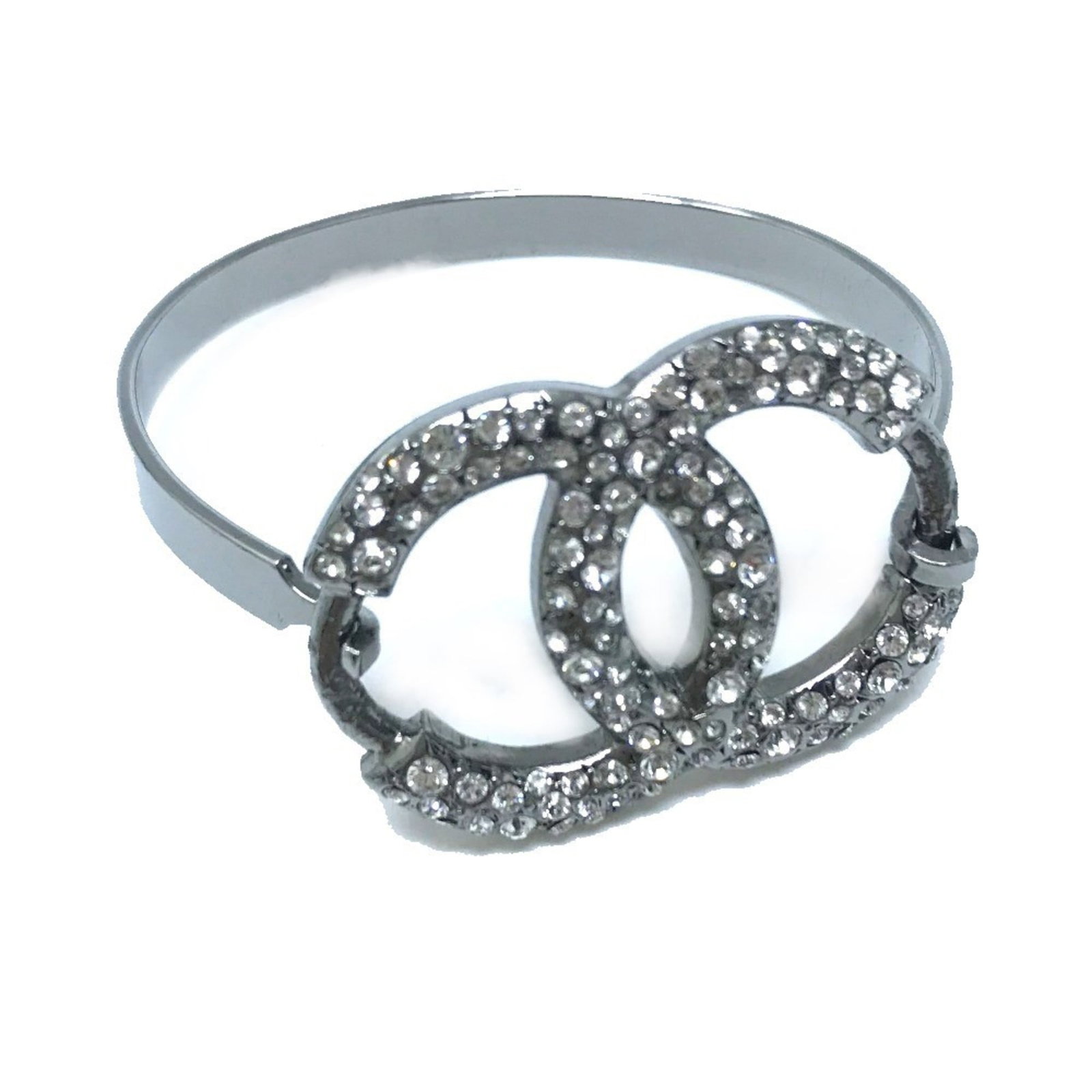 Chanel Charm Bracelet Metal, Rhinestone: Chanel Charm Bracelet Metal, Rhinestone Chanel's iconic charm bracelet features a metal and rhinestone design with a length of 15cm. The bracelet has traces of usage, showing scratches and dirt, but r