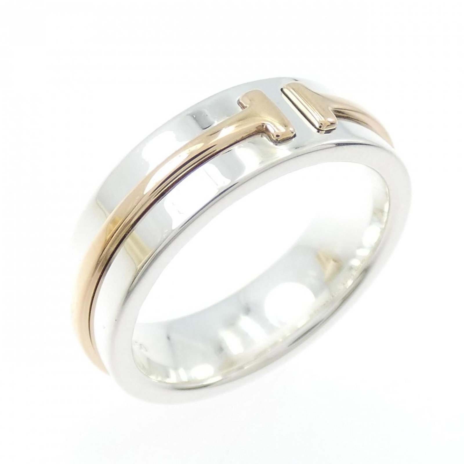 Tiffany Band Ring Pink Gold (18K), Silver 925: Tiffany Band Ring Pink Gold (18K), Silver 925 Pink Gold (18K) and Silver 925 come together in this elegant Tiffany band ring. The 6-size ring boasts a subtle pink gold hue with silver accents, making