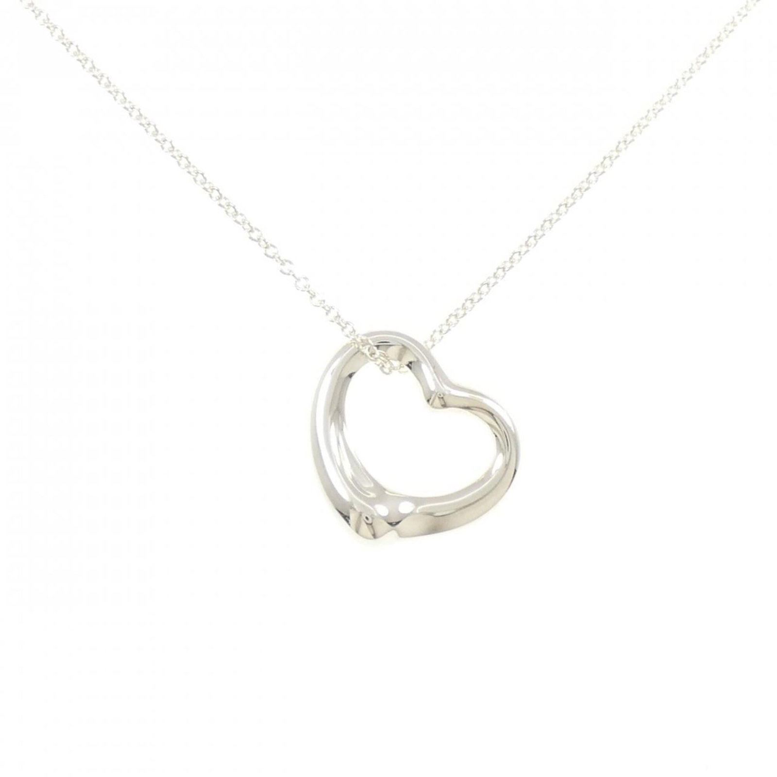 Tiffany Open Heart Necklace: Tiffany Open Heart Necklace The Tiffany Open Heart Necklace boasts an elegant silver design with a 21.3mm x 21mm pendant, making it a striking accessory for any woman's collection. Its durable 925 ste