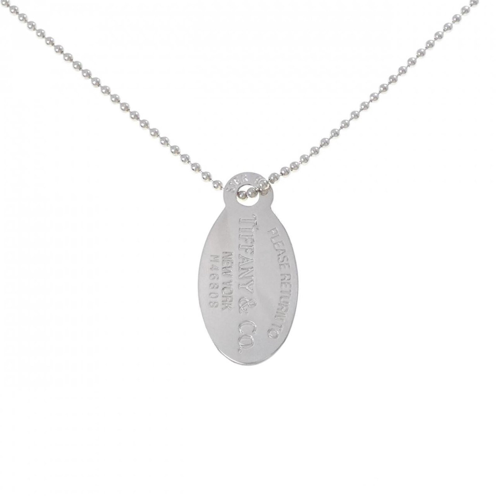 Tiffany & Co. Return to Necklace: Tiffany & Co. Return to Necklace Tiffany & Co. Return to Necklace - A timeless piece with subtle signs of wear, this silver necklace features a pendant with a few scratches and minor dirt marks, still