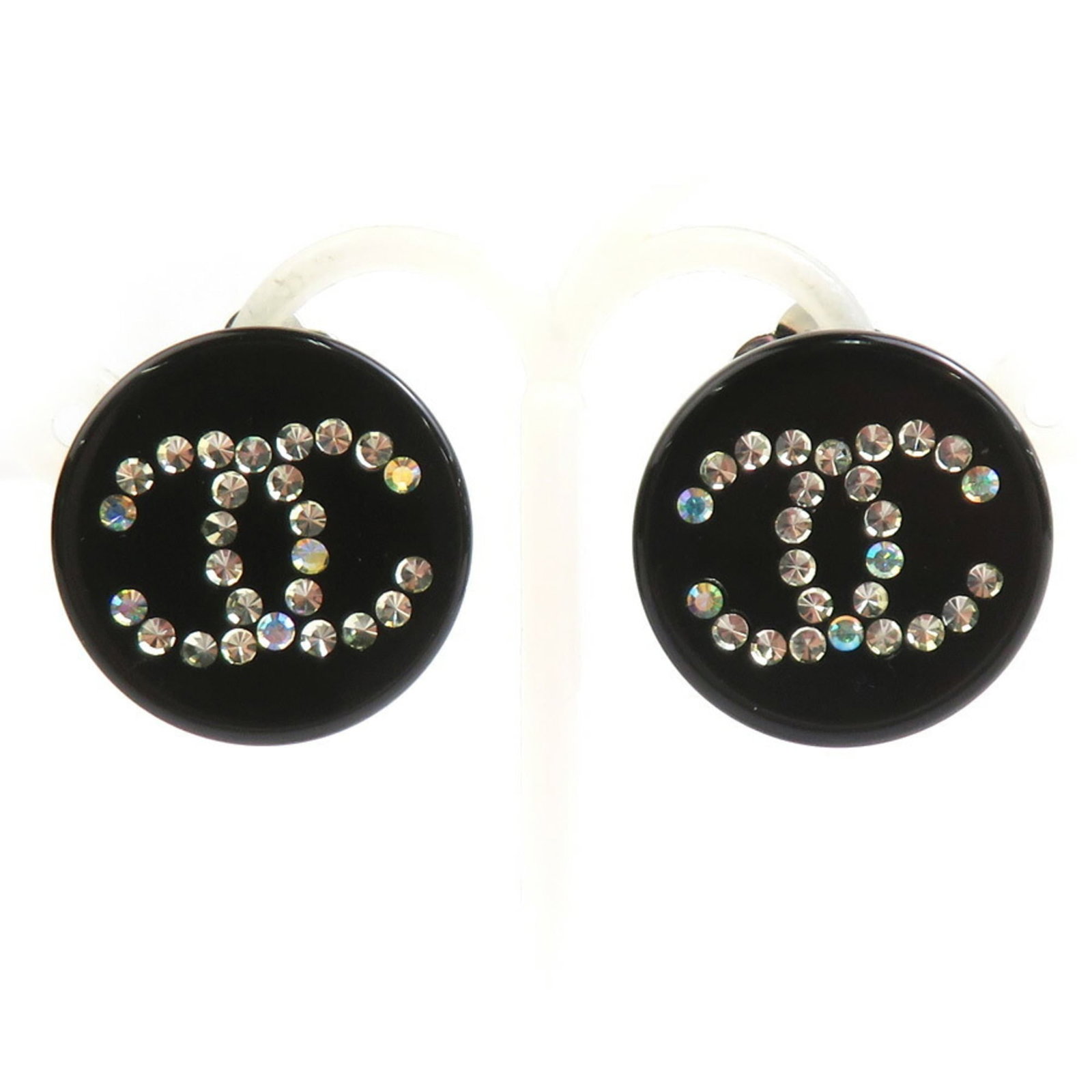 Chanel Clip Earrings Metal, Resin: Chanel Clip Earrings Metal, Resin Metal and resin construction gives these Chanel clip earrings a sleek, modern look. The black and silver color scheme adds a touch of sophistication, while minor