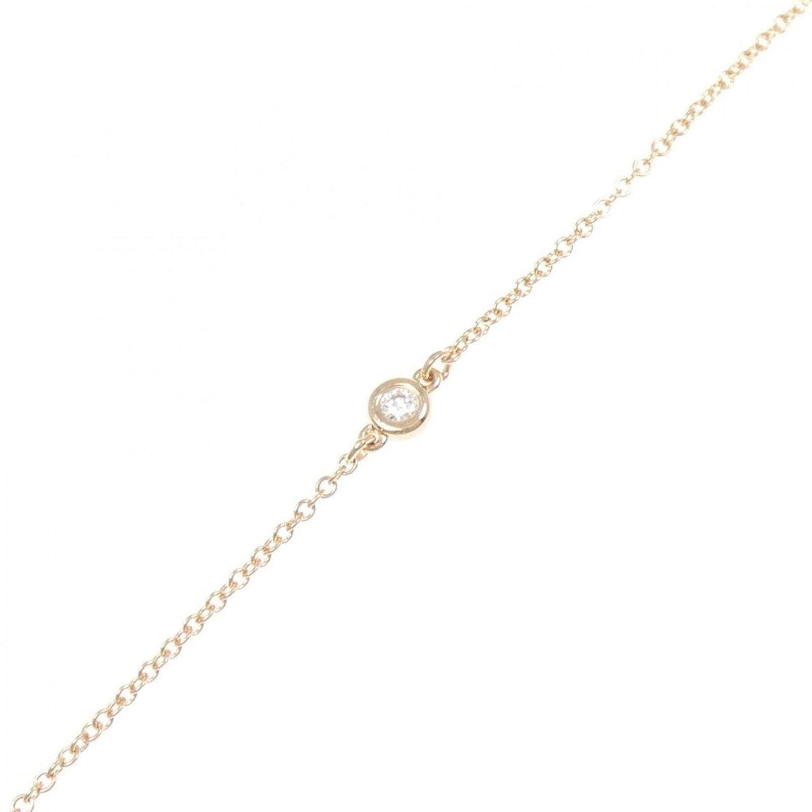 Tiffany Charm Bracelet Pink Gold (18K): Tiffany Charm Bracelet Pink Gold (18K) Pink Gold (18K) charm bracelet from Tiffany features a diamond stone and measures 18cm in length. This used item is in like new condition with hardly any traces 