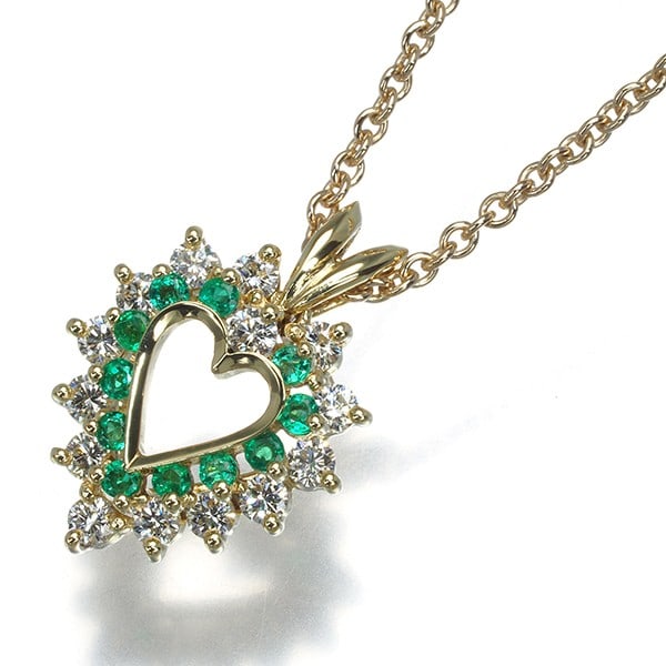 Tiffany Co Necklace Emerald Heart 18 K Yellow Gold: Tiffany Co Necklace Emerald Heart 18 K Yellow Gold Tiffany & Co.'s 18k yellow gold necklace showcases a stunning natural emerald at its center, set in a beautiful pendant design. The piece's metal