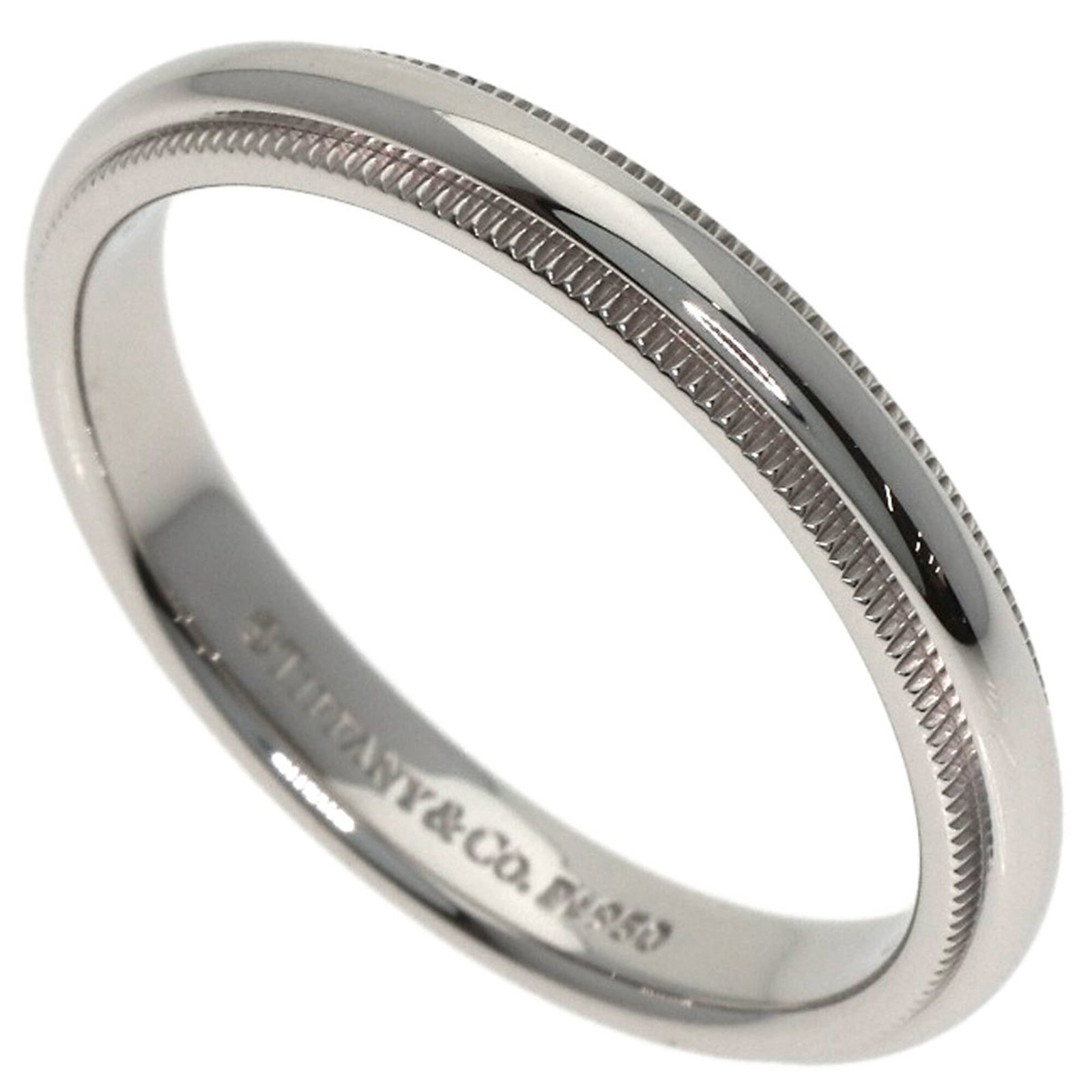 Tiffany Band Ring: Tiffany Band Ring Platinum band ring from Tiffany featuring a sleek design with a 3mm width and 8 US size. This used ring shows some minor signs of wear, including scratches and dirt, but remains in
