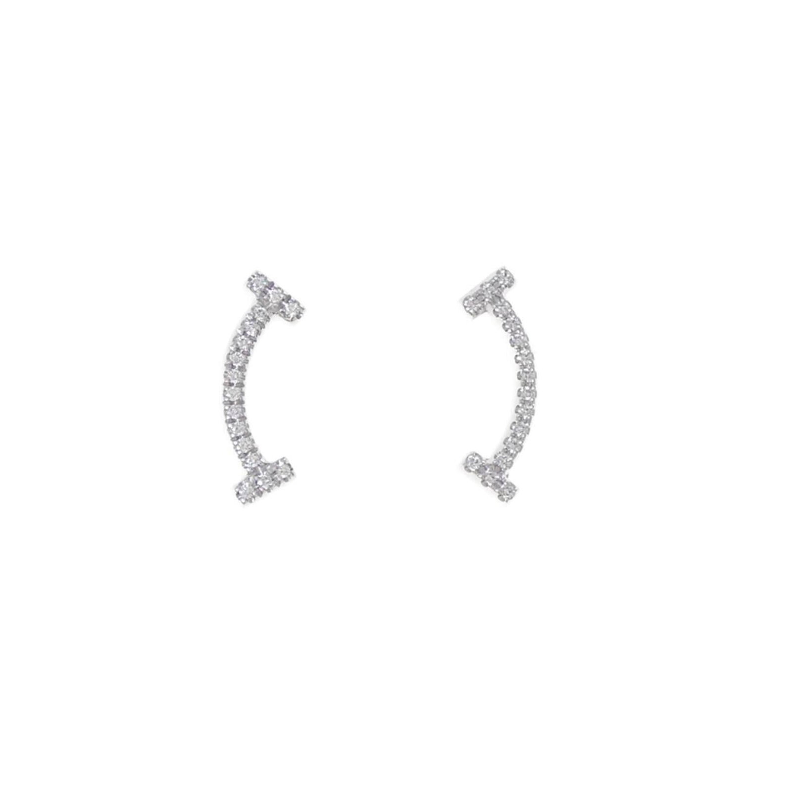 Tiffany Stud Earrings White Gold (18K): Tiffany Stud Earrings White Gold (18K) Tiffany's iconic stud earrings shine in white gold (18K) with a subtle sparkle from a diamond. The elegant design features a 13.10mm x 4.50mm diamond, carefully 