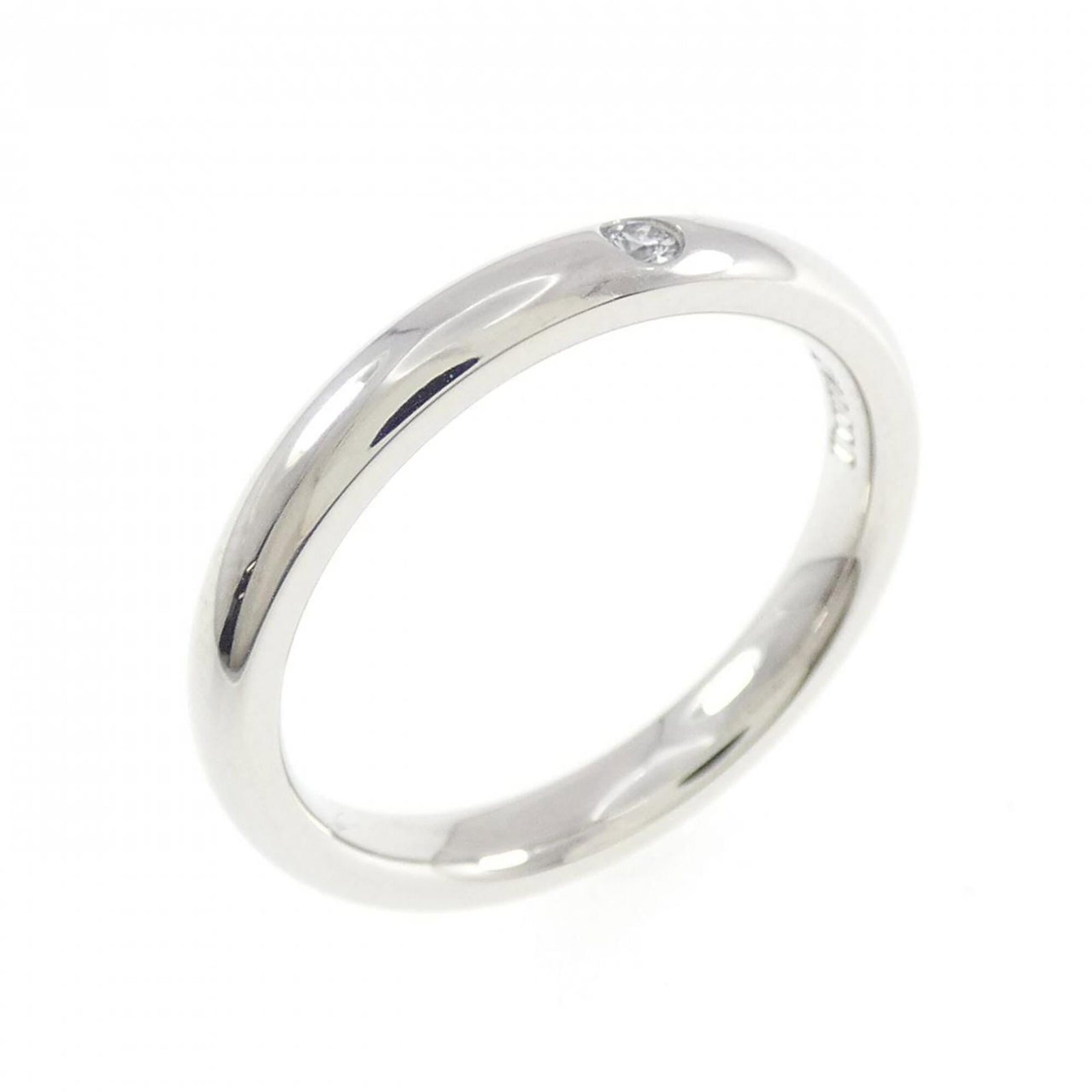 Tiffany Band Ring Platinum 950: Tiffany Band Ring Platinum 950 Platinum band ring with diamond stone from Tiffany, featuring a high-quality platinum material and a classic design. This used item is in like new condition, with hardly