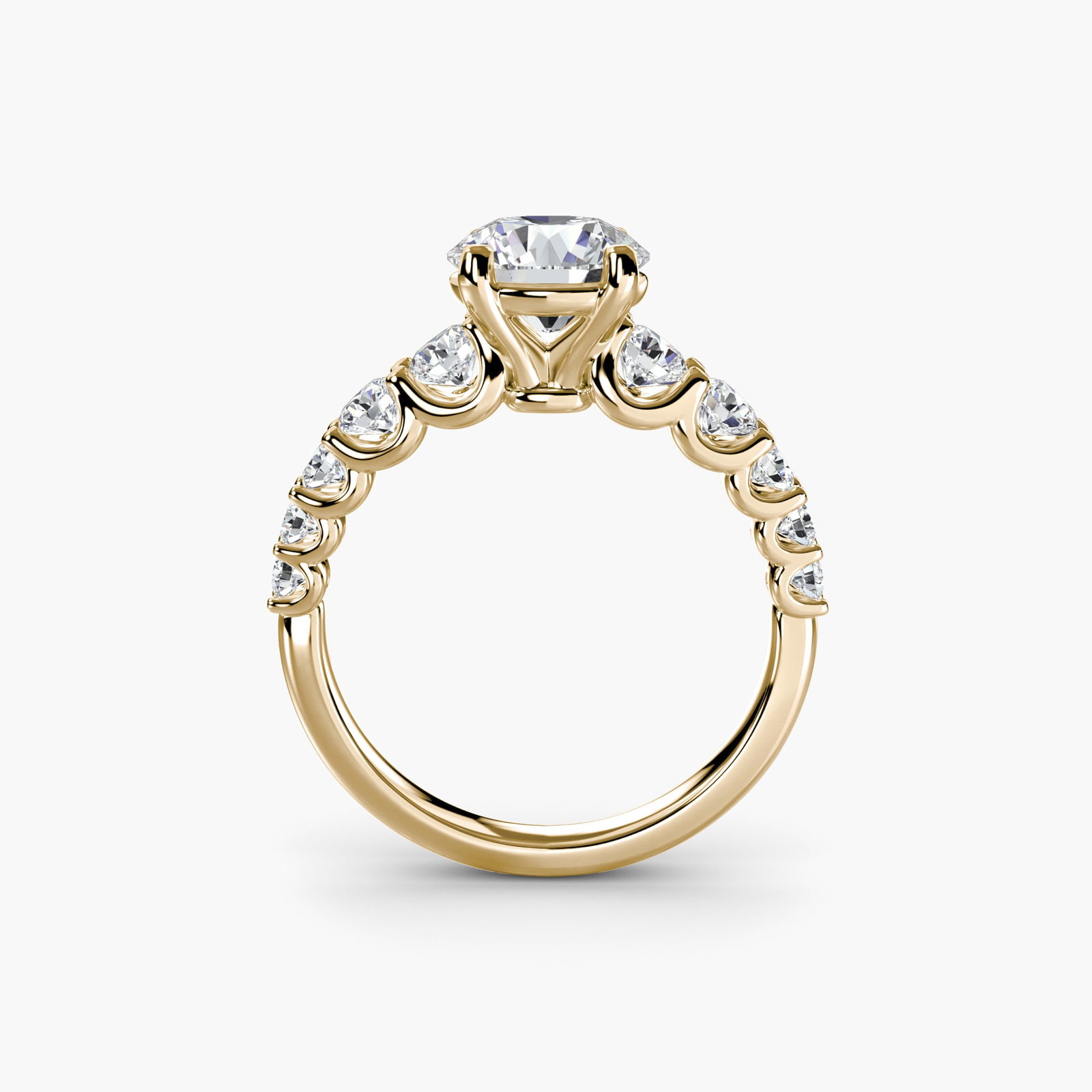 Side Stone Round 18Kt Yellow Gold Ring Setting: Side Stone Round 18Kt Yellow Gold Ring Setting The Side Stone Round 18Kt Yellow Gold Ring Setting boasts 10 lab-grown side stones totaling 1.38 carats in EF/VS clarity and colour. This stunning settin