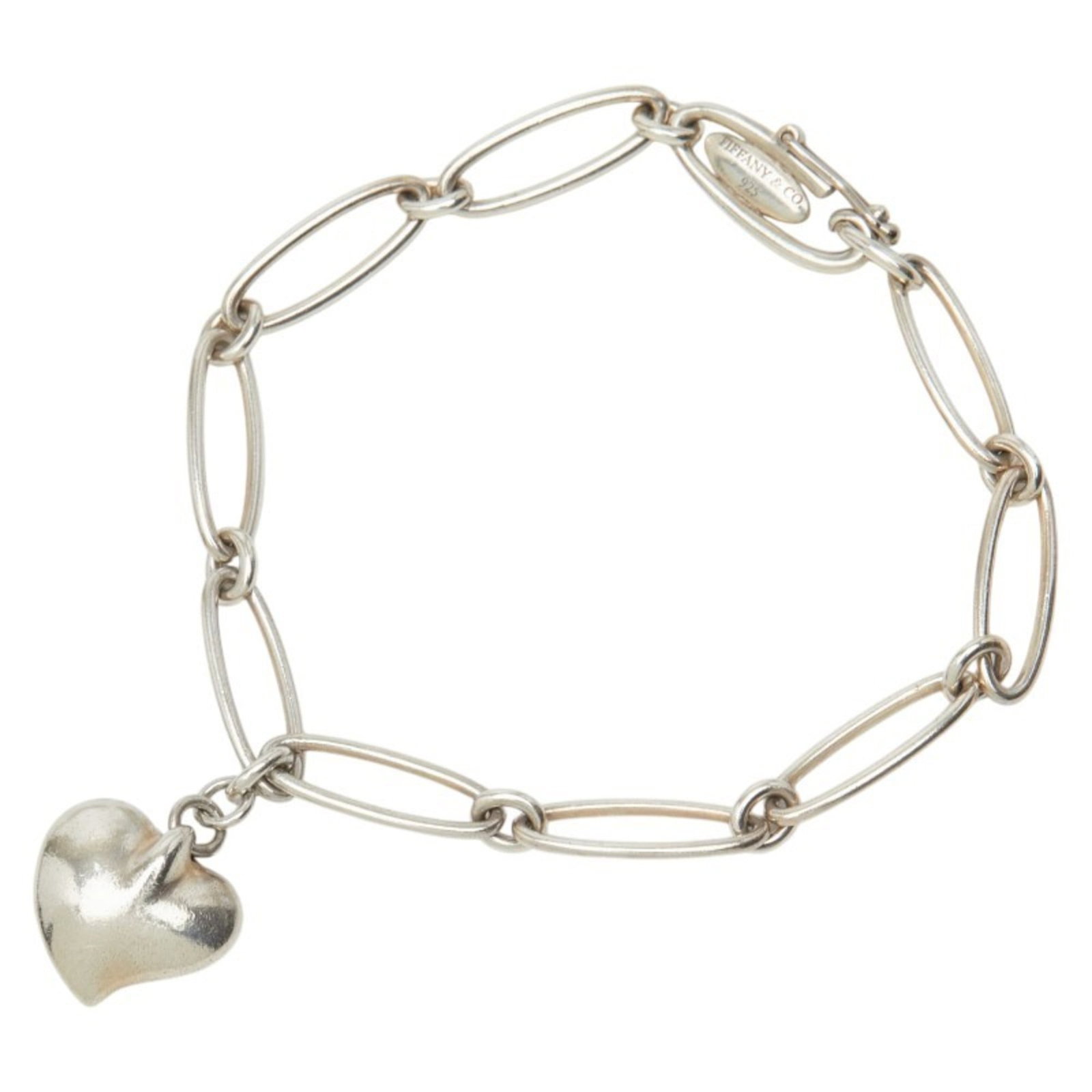 Tiffany Charm Bracelet Silver 925: Tiffany Charm Bracelet Silver 925 Silver 925 charm bracelet from Tiffany with a few traces of usage, some scratches and dirt visible. The bracelet remains in very good condition overall, showcasing it