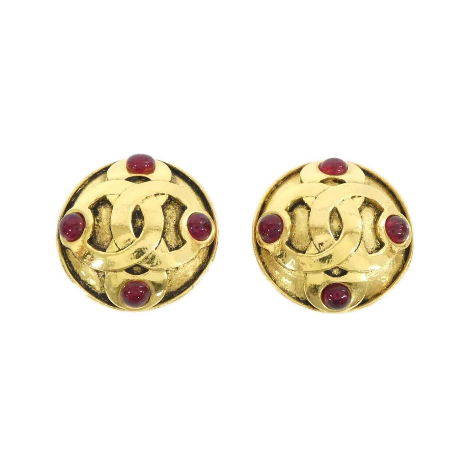 Chanel Clip Earrings: Chanel Clip Earrings Chanel Clip Earrings in Gold and Red. These clip earrings feature a classic design with a subtle gold and red color scheme, adding a touch of sophistication to any outfit. In