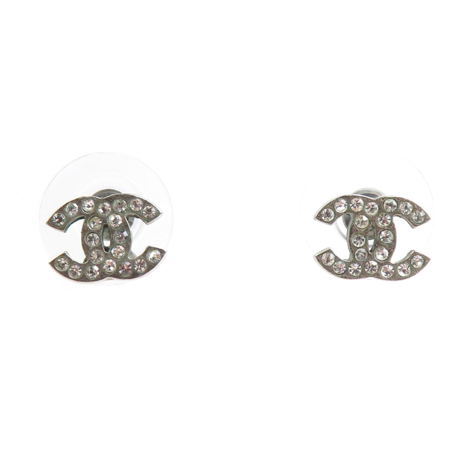 Chanel Stud Earrings Metal: Chanel Stud Earrings Metal Stud earrings from iconic French fashion house Chanel, featuring sleek metal design in silver finish. The subtle studs are crafted with a durable material and have a compact