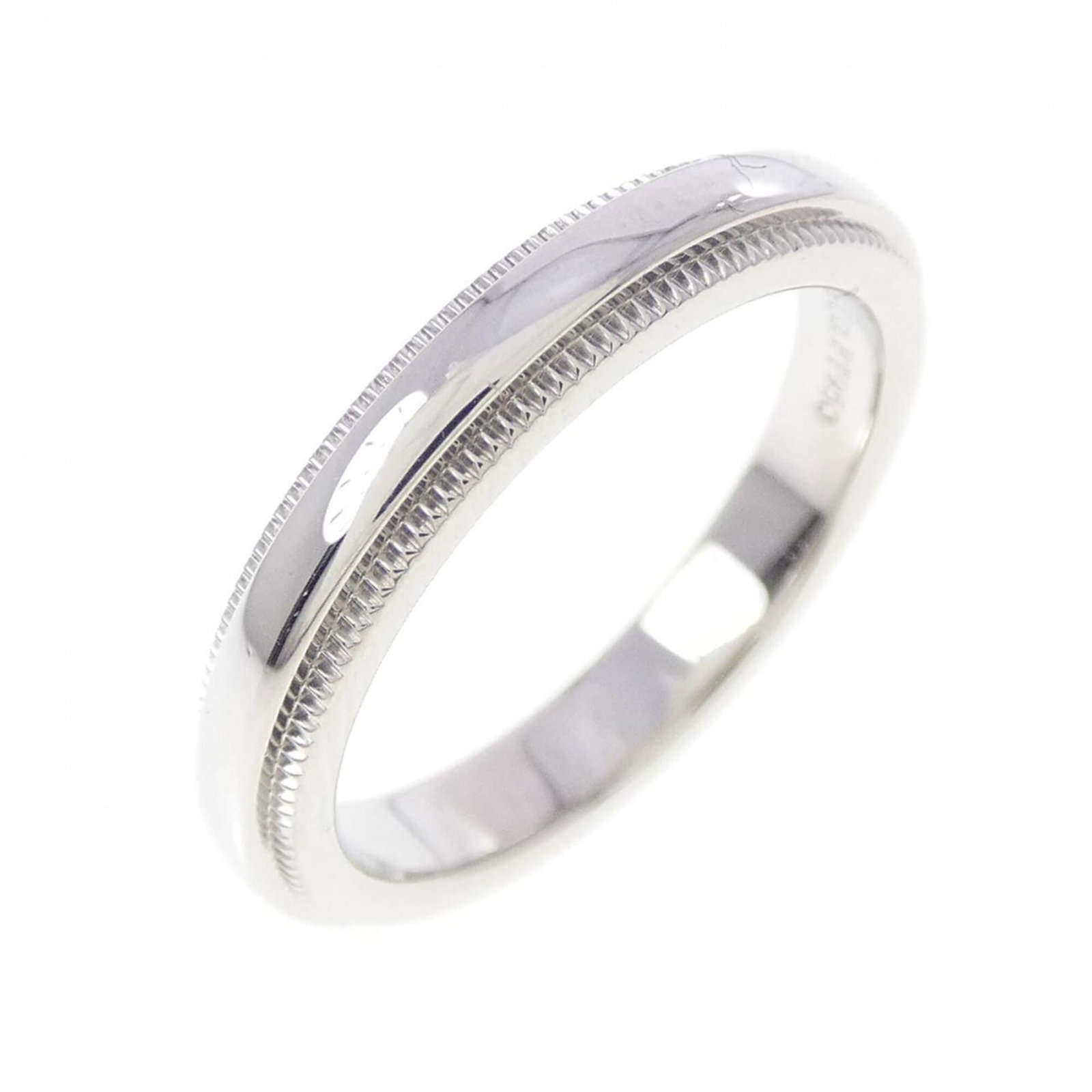 Tiffany Band Ring Platinum 950: Tiffany Band Ring Platinum 950 Platinum 950 band ring from Tiffany featuring a sleek design with a width of 3mm and an us size of 3.5. The ring showcases some minor scratches and dirt, giving it a