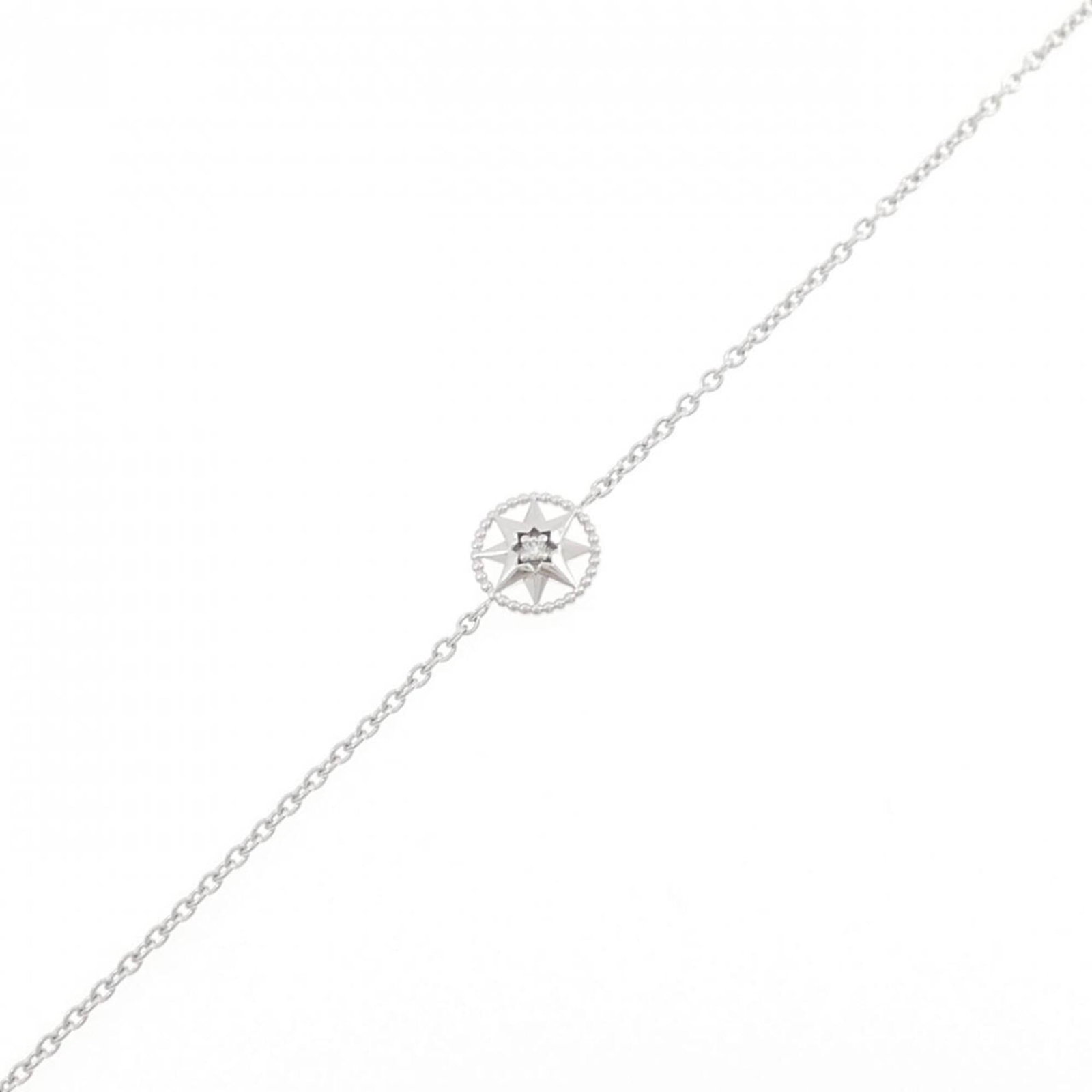 Christian Dior Charm Bracelet White Gold (18K): Christian Dior Charm Bracelet White Gold (18K) Christian Dior's iconic charm bracelet shines in white gold (18K), featuring a delicate diamond accent. This 15cm-18cm (5.9''-7.08'') length charm bracel