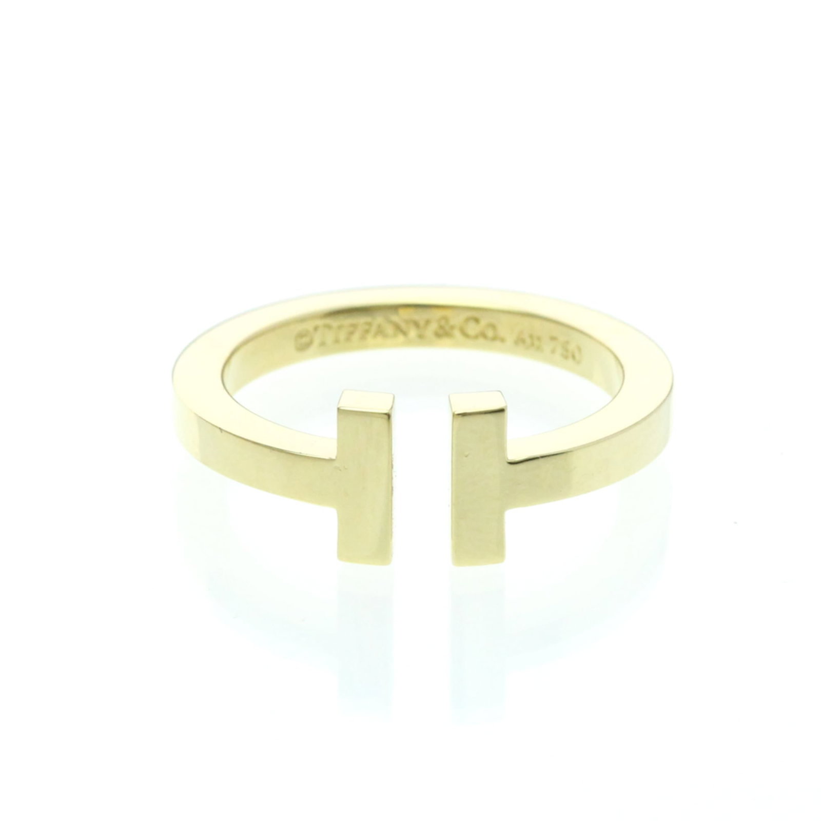 Tiffany Band Ring Yellow Gold (18K): Tiffany Band Ring Yellow Gold (18K) Yellow Gold (18K) Tiffany Band Ring for Men and Women. This 18K yellow gold band ring features a classic fashion design with a width of 7.7mm / 0.3'' and weighs 7.1