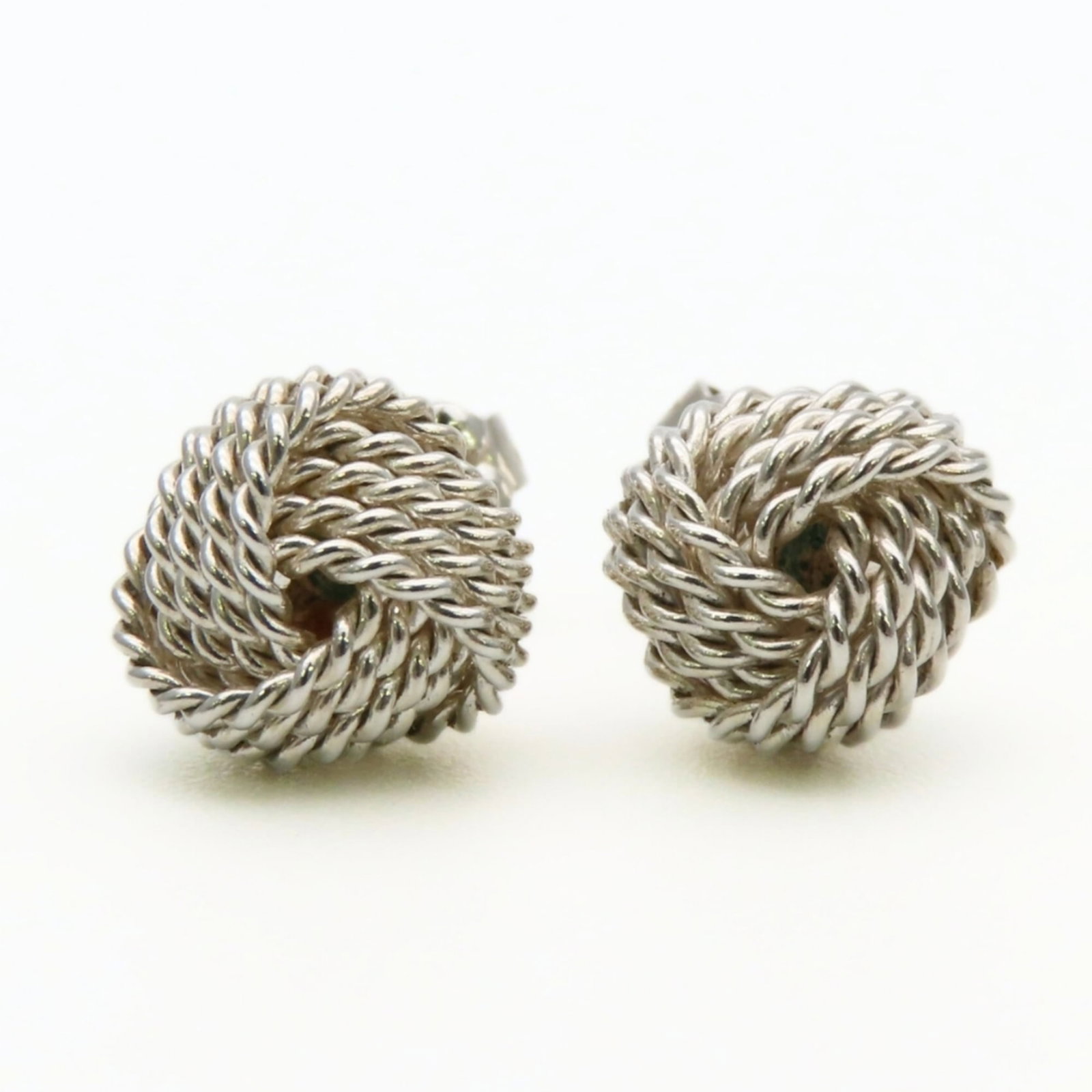Tiffany Stud Earrings Silver 925: Tiffany Stud Earrings Silver 925 Tiffany's iconic stud earrings shine in silver 925. With their classic design and subtle sparkle, these elegant earrings are perfect for adding a touch of sophisticati