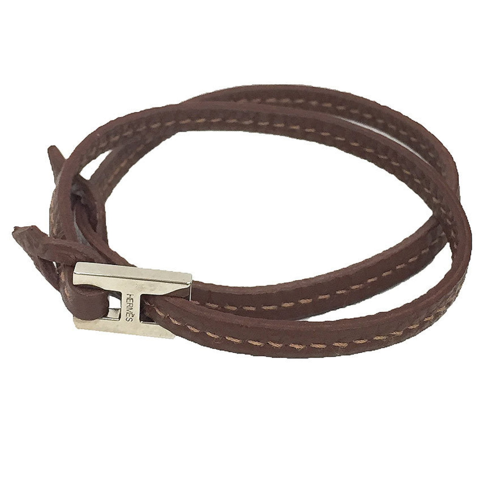 Hermes Charm Bracelet Leather: Hermes Charm Bracelet Leather Brown leather charm bracelet from Hermes with a total length of 34cm. The bracelet has some scratches and dirt, but remains in very good condition overall. A few traces o
