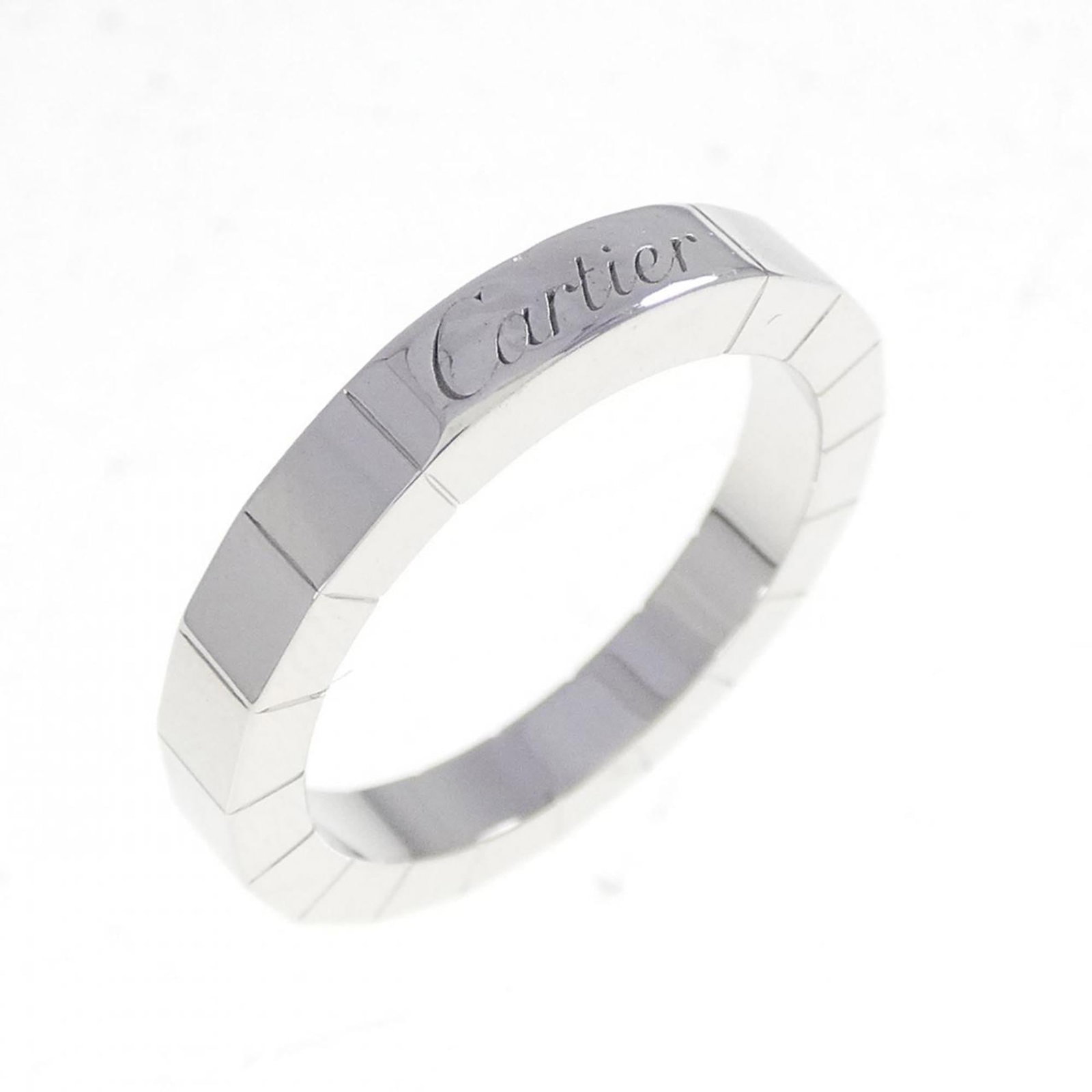 Cartier Band Ring White Gold (18K): Cartier Band Ring White Gold (18K) Cartier Band Ring White Gold (18K) features a sleek and sophisticated design, showcasing the luxury of 18K white gold. A few traces of usage can be seen, with some m
