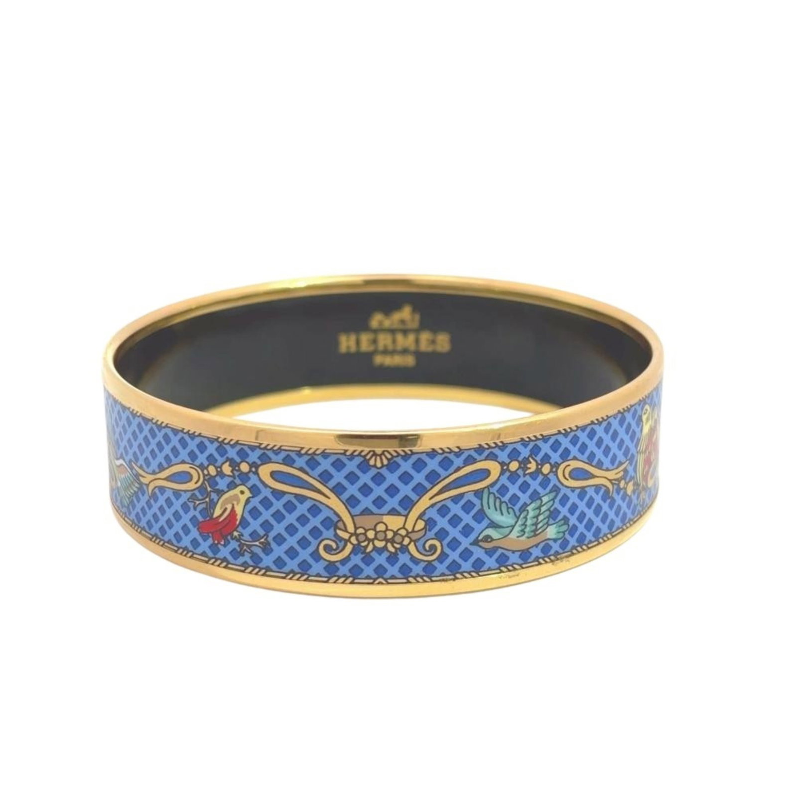 Hermes Bangle Cloisonn/Enamel: Hermes Bangle Cloisonn/Enamel A stunning Hermes Bangle Cloisonn/Enamel in blue and gold, this beautiful piece boasts intricate enamelwork and a timeless design. Measuring 18.5cm in length, its