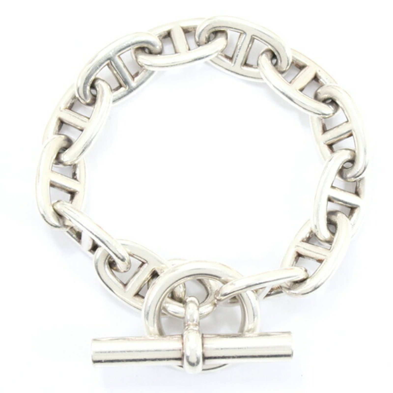 Hermes Charm Bracelet Silver 925: Hermes Charm Bracelet Silver 925 The Hermes Charm Bracelet Silver 925 boasts a classic design with subtle signs of wear, its silver 925 material remaining strong and durable. Measuring 18.5cm in lengt