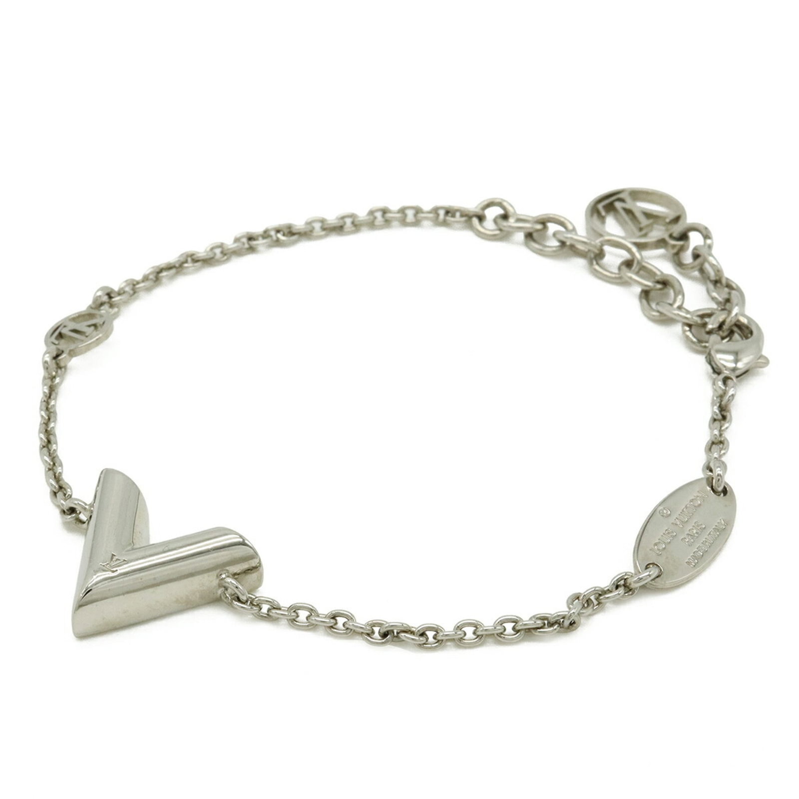 Louis Vuitton Charm Bracelet Metal: Louis Vuitton Charm Bracelet Metal Silver Louis Vuitton Charm Bracelet with a few traces of usage and some scratches/dirt. Made from metal, this unisex charm bracelet measures 19cm in length. In very 