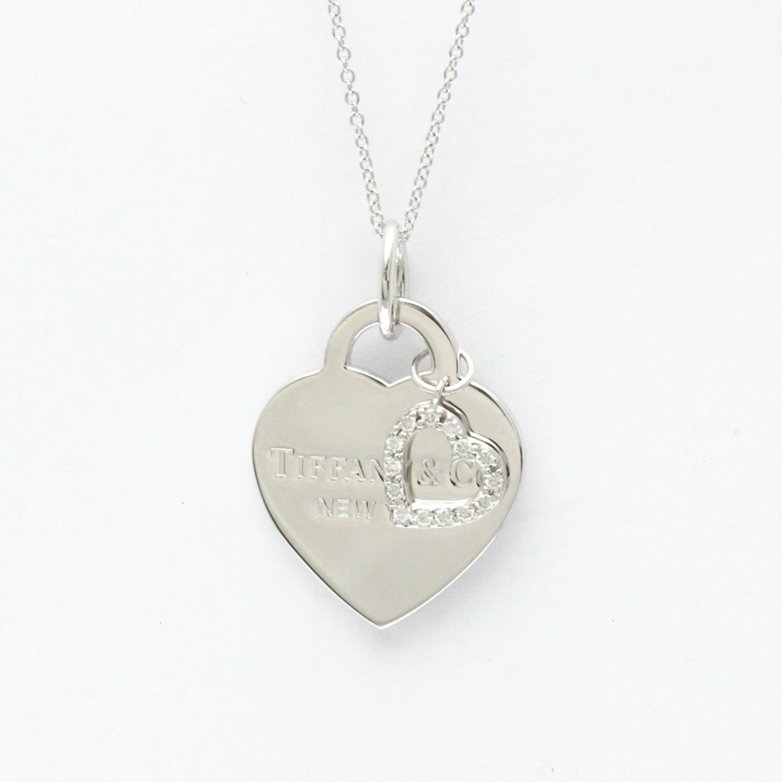 Tiffany Heart Ginza Limited Edition Diamond Necklace White Gold (18K) Diamond Men,Women Fashion: Tiffany Heart Ginza Limited Edition Diamond Necklace White Gold (18K) Diamond Men,Women Fashion Pendant Necklace (Silver) Tiffany's iconic Heart Ginza Limited Edition Diamond Necklace features a