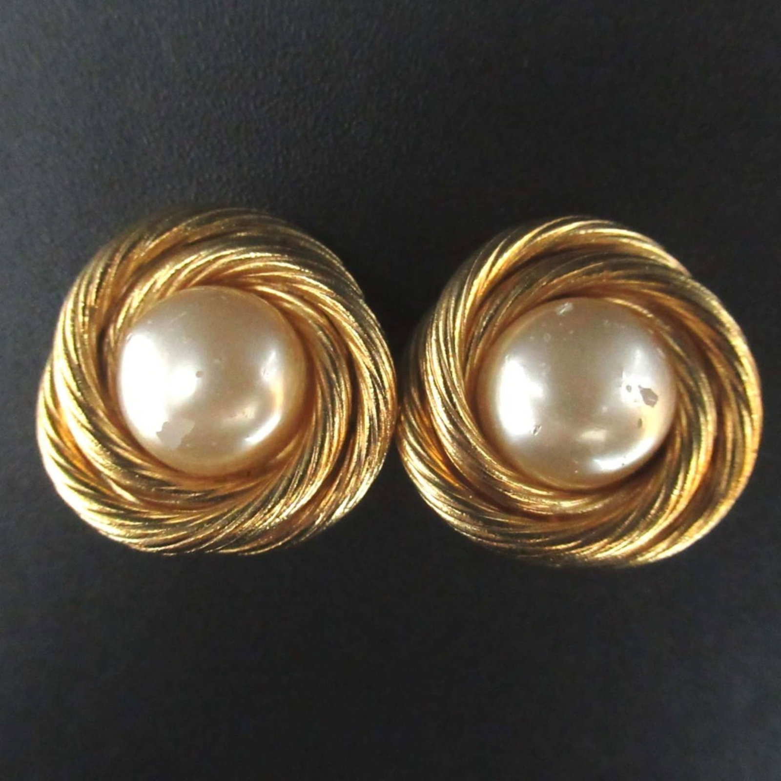 Chanel Clip Earrings Gold Plating: Chanel Clip Earrings Gold Plating Gold Plating Details Stand Out on These Chic Chanel Clip Earrings. Made from Gold Plating, they feature a sleek design with a subtle shine. Measuring 25mm x 25mm in