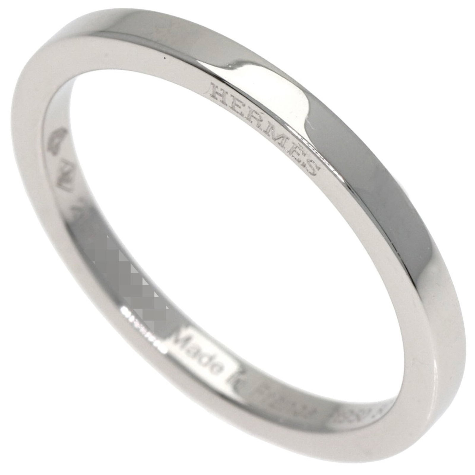 Hermes Band Ring Platinum 950: Hermes Band Ring Platinum 950 Platinum 950 band ring from Hermes features a durable and luxurious material. The ring has some minor scratches and dirt, but remains in very good condition overall.