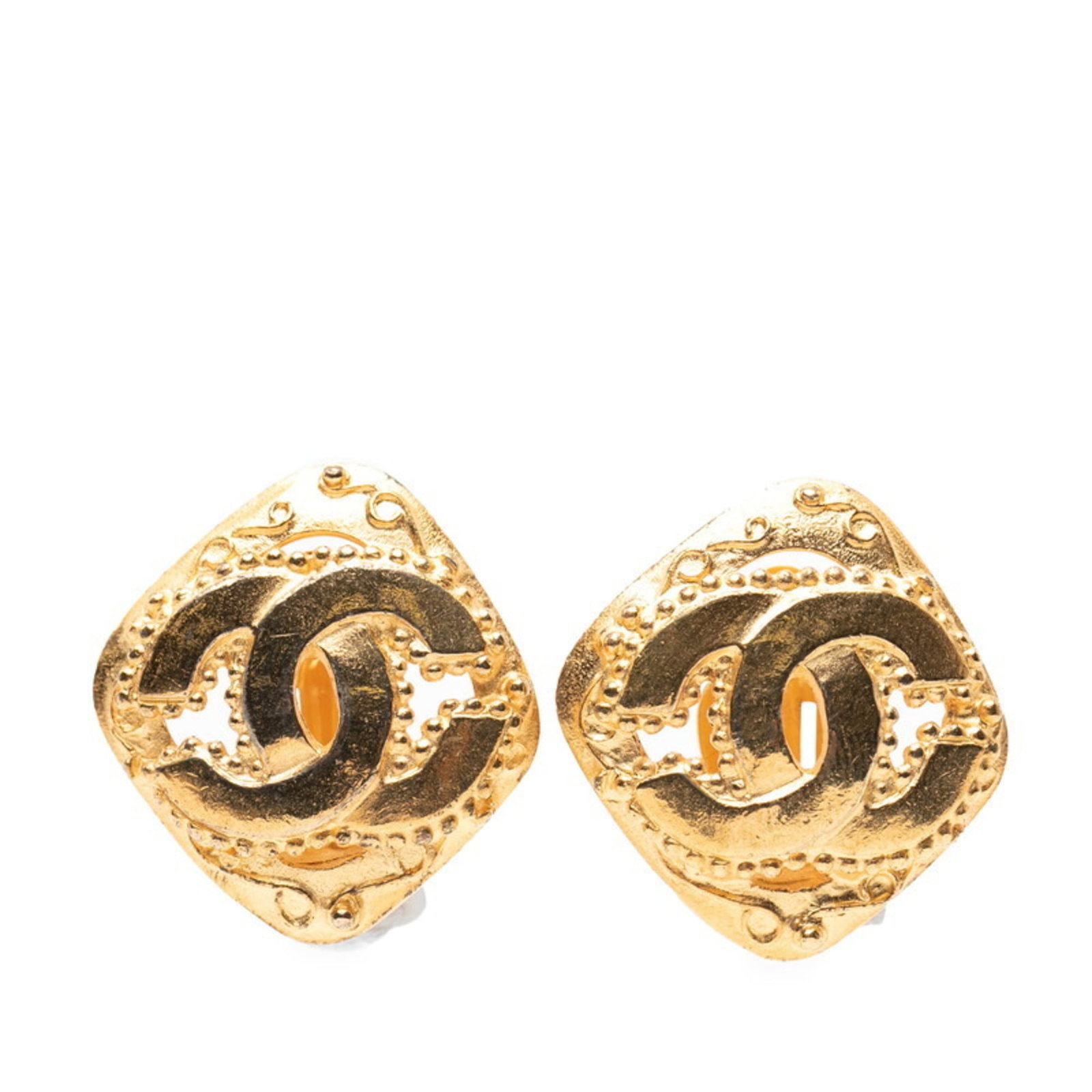 Chanel Clip Earrings Gold Plating: Chanel Clip Earrings Gold Plating Chanel Clip Earrings in Gold Plating feature a timeless design with intricate details. The gold plating gives these earrings a luxurious touch, while their compact