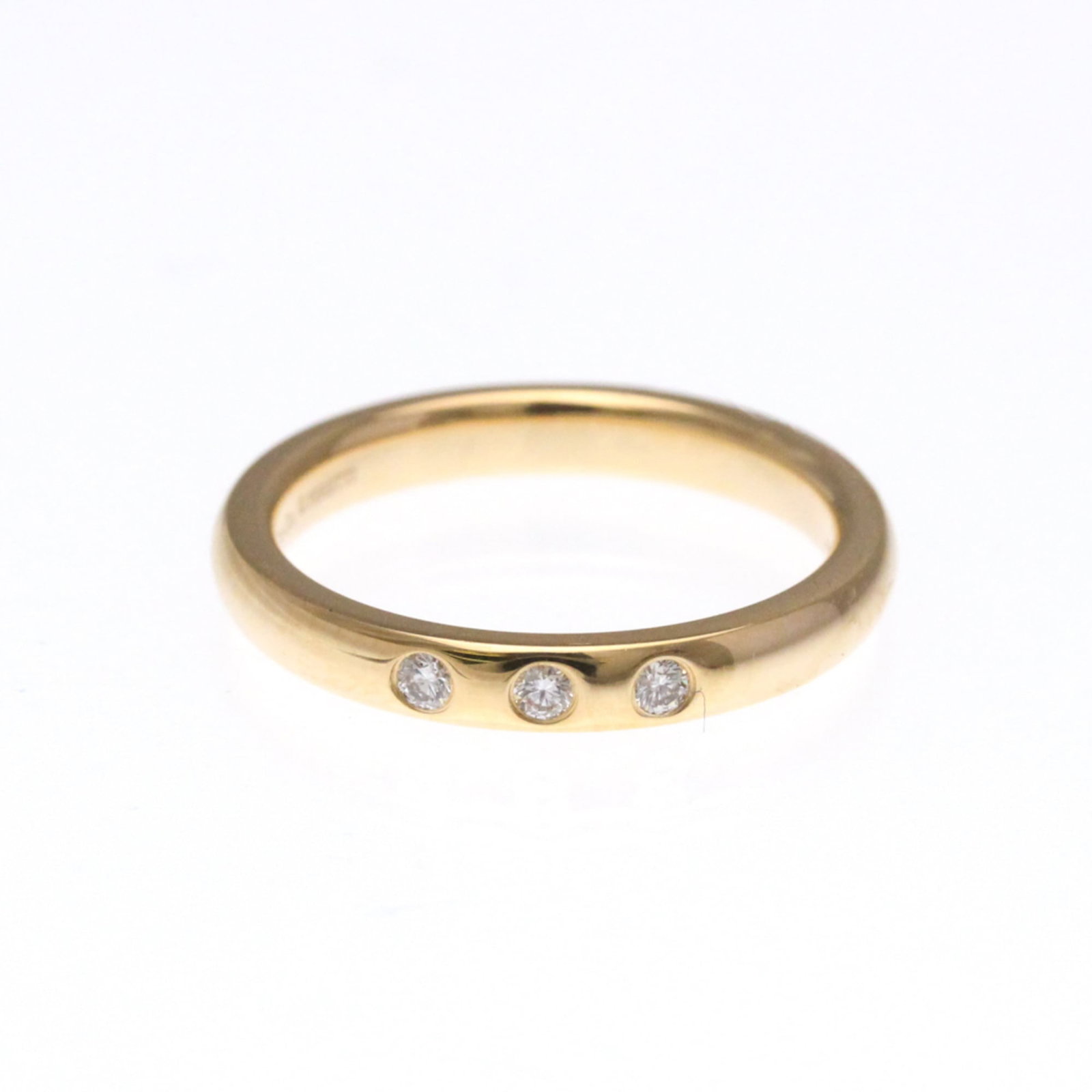 Tiffany Band Ring Pink Gold (18K): Tiffany Band Ring Pink Gold (18K) Tiffany's iconic pink gold band ring makes a statement with its elegant design and luxurious feel. This 18K pink gold ring features a diamond stone and measures