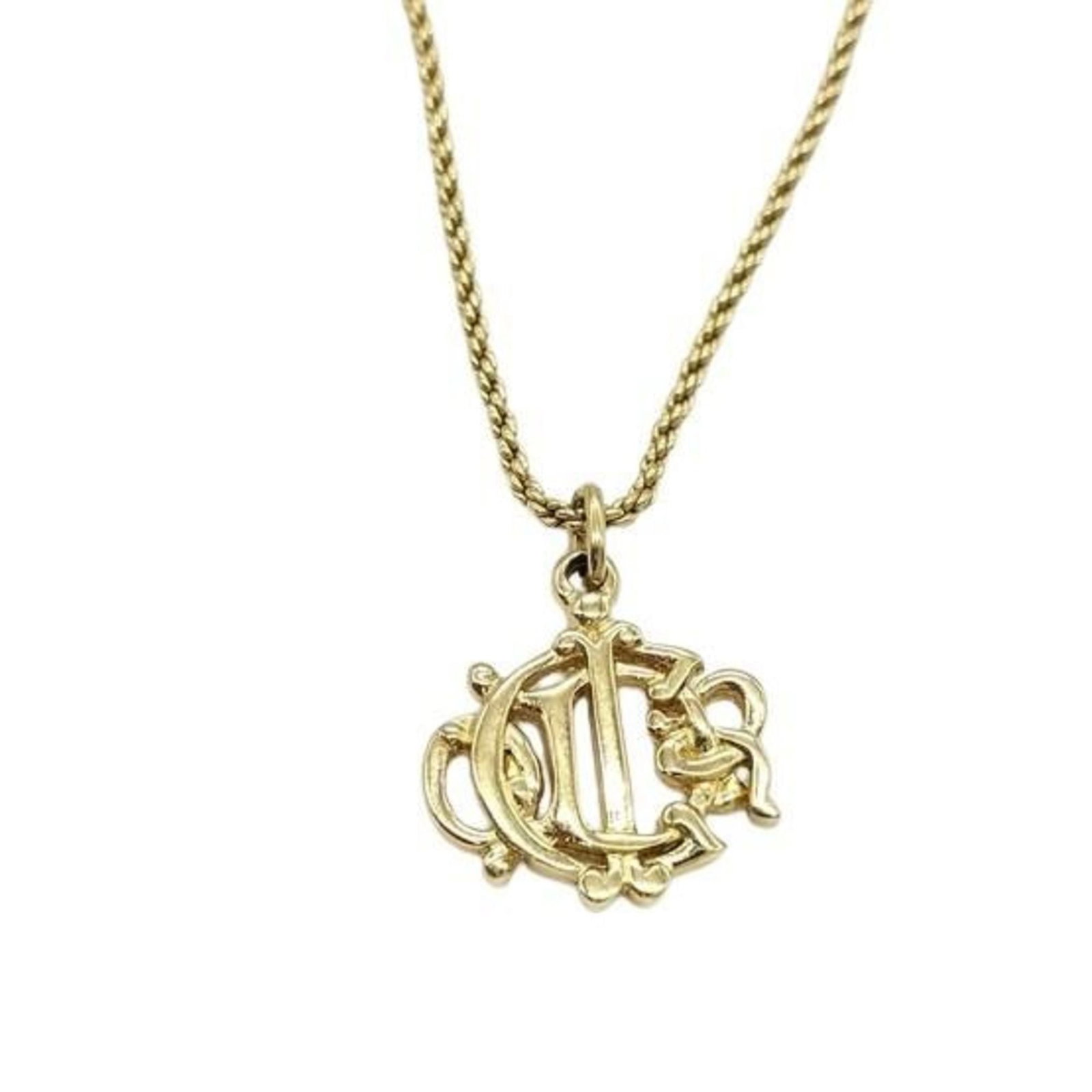 Christian Dior Necklace Emblem Gold Metal Women's: Christian Dior Necklace Emblem Gold Metal Women's Gold metal Christian Dior necklace emblem pendant features a prominent design element. The 44 cm adjustable neck circumference and 22mm x 17mm