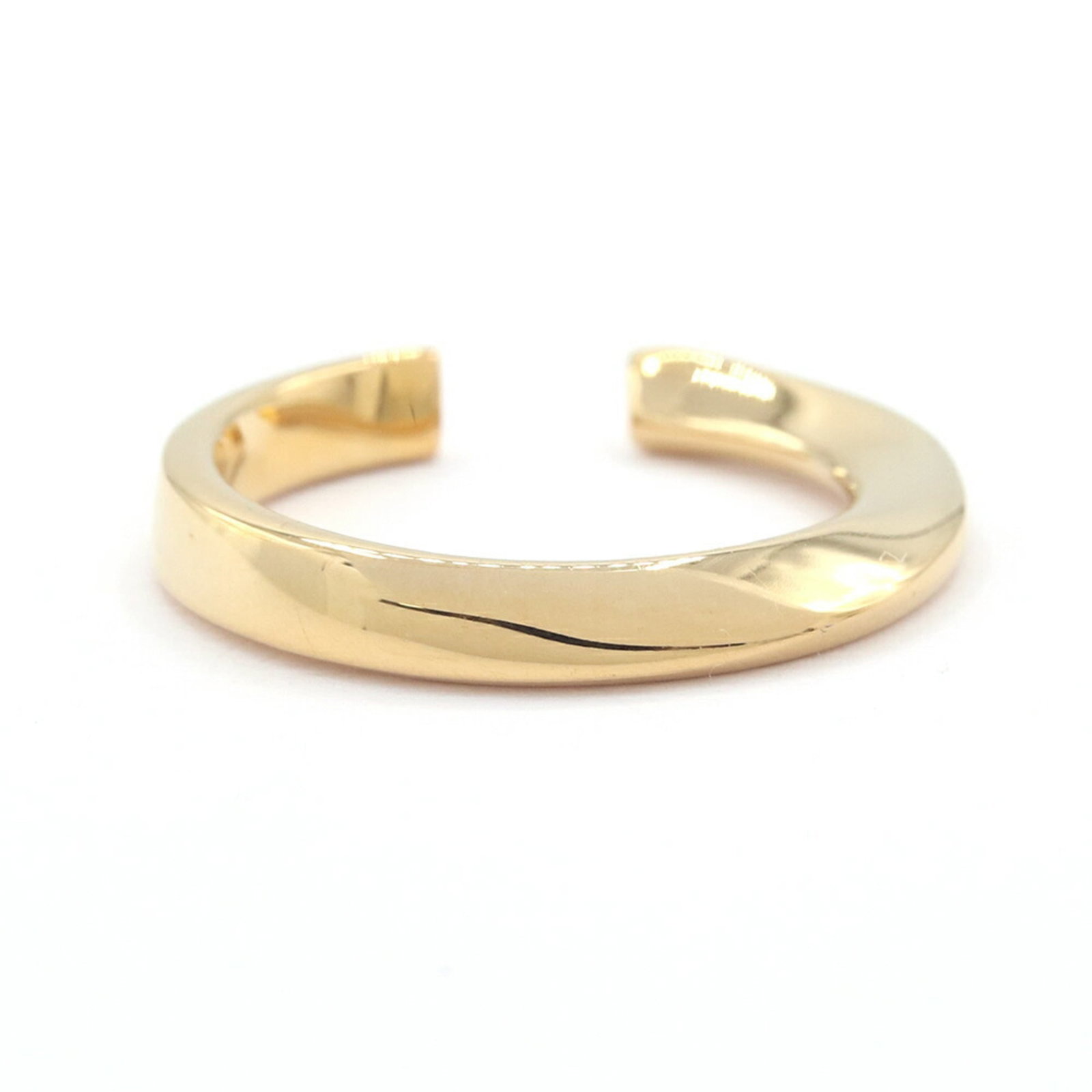 Yves Saint Laurent Band Ring Metal: Yves Saint Laurent Band Ring Metal The Yves Saint Laurent Band Ring Metal boasts a sleek, gold metal design, adding a touch of sophisticated elegance to any outfit. With its slender band and understat