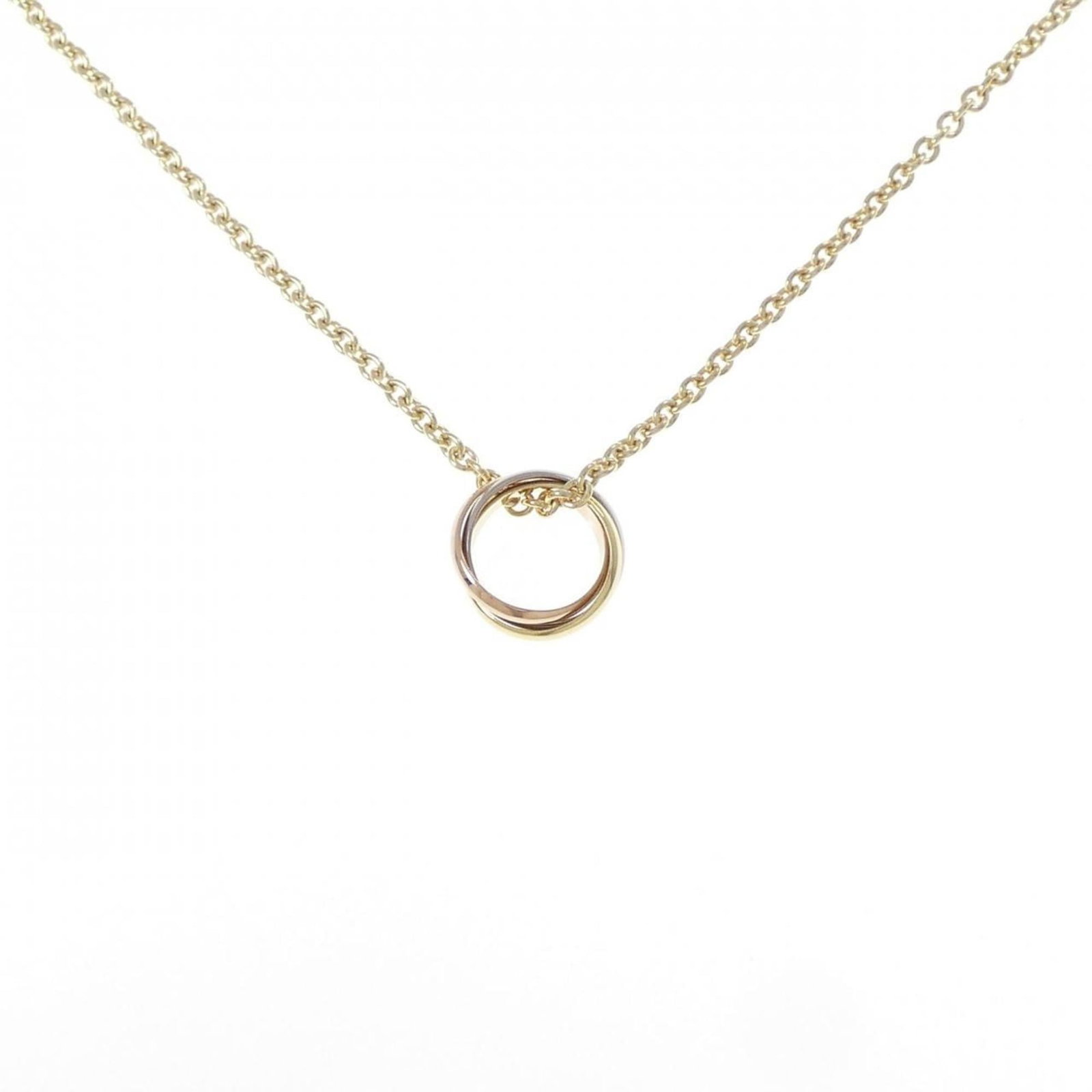 Cartier Trinity Necklace: Cartier Trinity Necklace Cartier's iconic Trinity Necklace boasts a timeless design featuring three interconnected gold bands in pink, white, and yellow hues. The necklace's elegant pendant measures 1