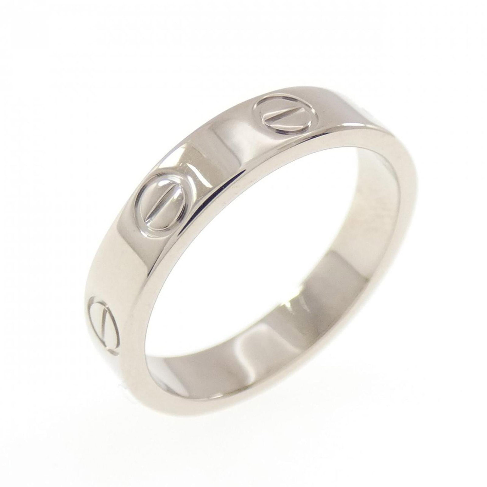 Cartier Band Ring White Gold (18K): Cartier Band Ring White Gold (18K) Cartier Band Ring White Gold (18K) features a sleek and sophisticated design, showcasing the luxury of 18K white gold. A few traces of usage can be seen, with some m