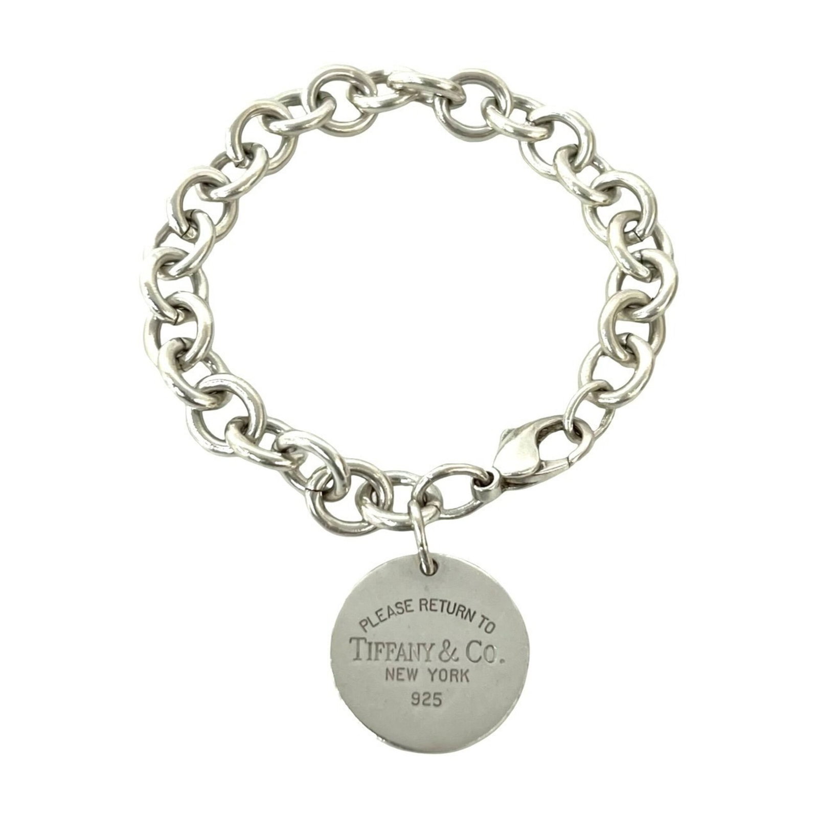 Tiffany Charm Bracelet Silver 925: Tiffany Charm Bracelet Silver 925 Silver 925 Tiffany Charm Bracelet with Traces of Usage. This used charm bracelet features silver 925 material and has a length of 19cm / 7.48''. It shows signs of