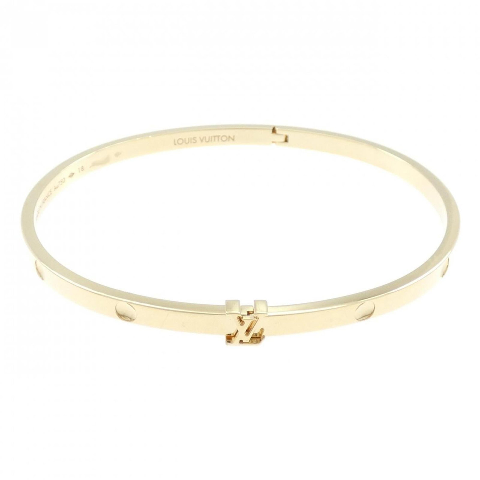 Louis Vuitton Bangle Yellow Gold (18K): Louis Vuitton Bangle Yellow Gold (18K) The Louis Vuitton Bangle Yellow Gold (18K) boasts a sleek design and luxurious yellow gold finish, measuring 18cm in length. With its subtle scratches and minor
