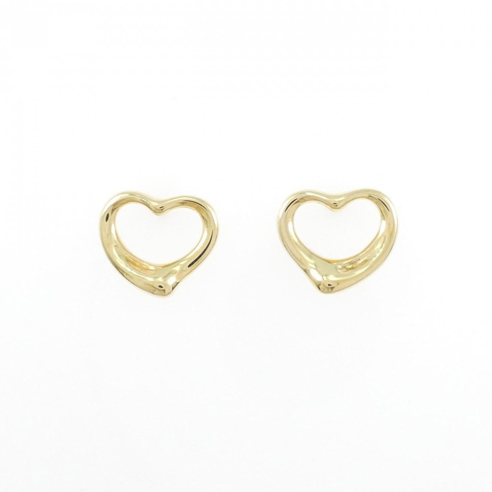 Tiffany Stud Earrings Yellow Gold (18K): Tiffany Stud Earrings Yellow Gold (18K) Yellow Gold (18K) Tiffany Stud Earrings are crafted with 9.00mm x 10.40mm dimensions and feature a sturdy design. Made from high-quality yellow gold, these