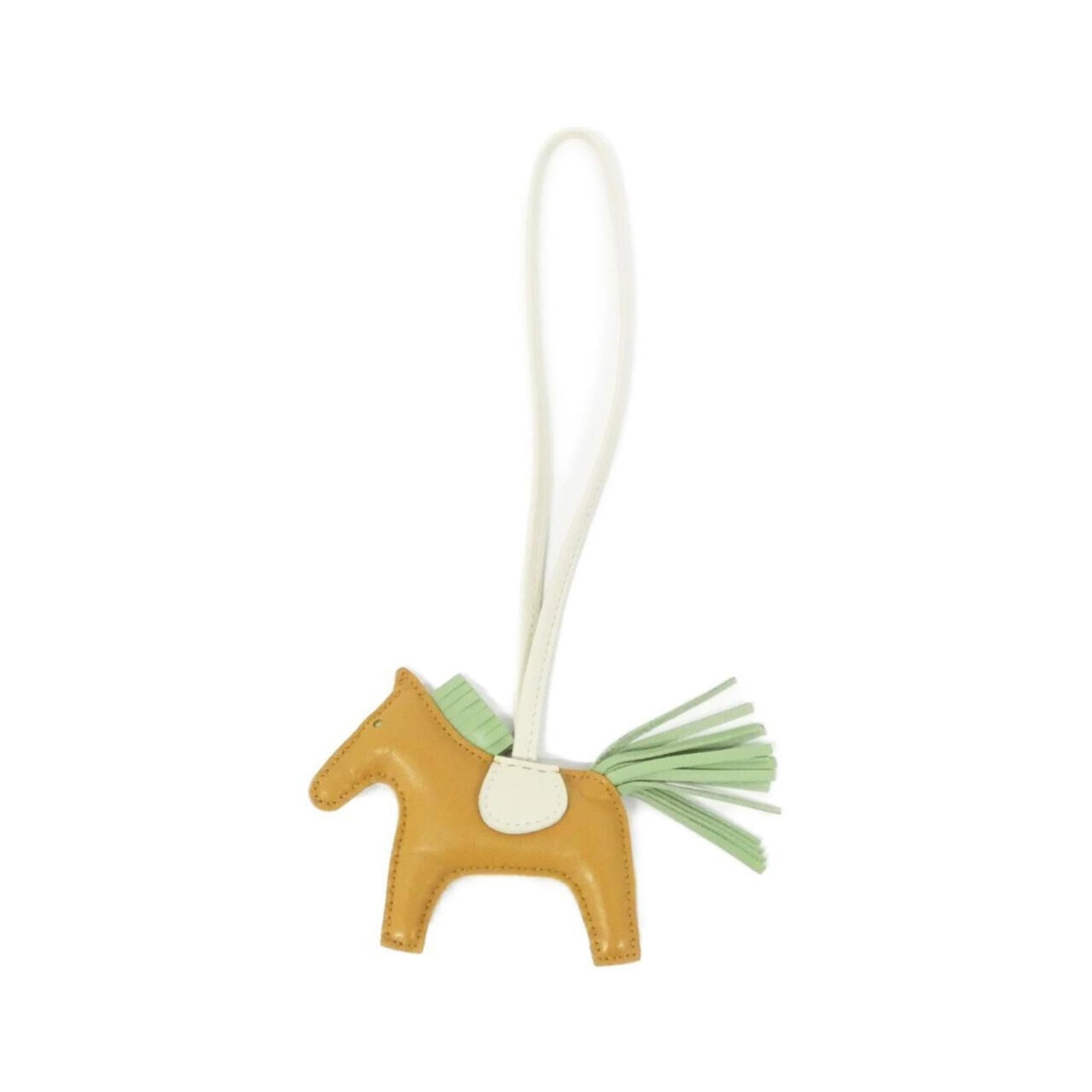 Hermes Handbag Charm Agneau Milo: Hermes Handbag Charm Agneau Milo Agneau Milo charm from Hermes features a unique design with a few traces of usage, some scratches and dirt visible. The chain length is 360mm, providing a stylish