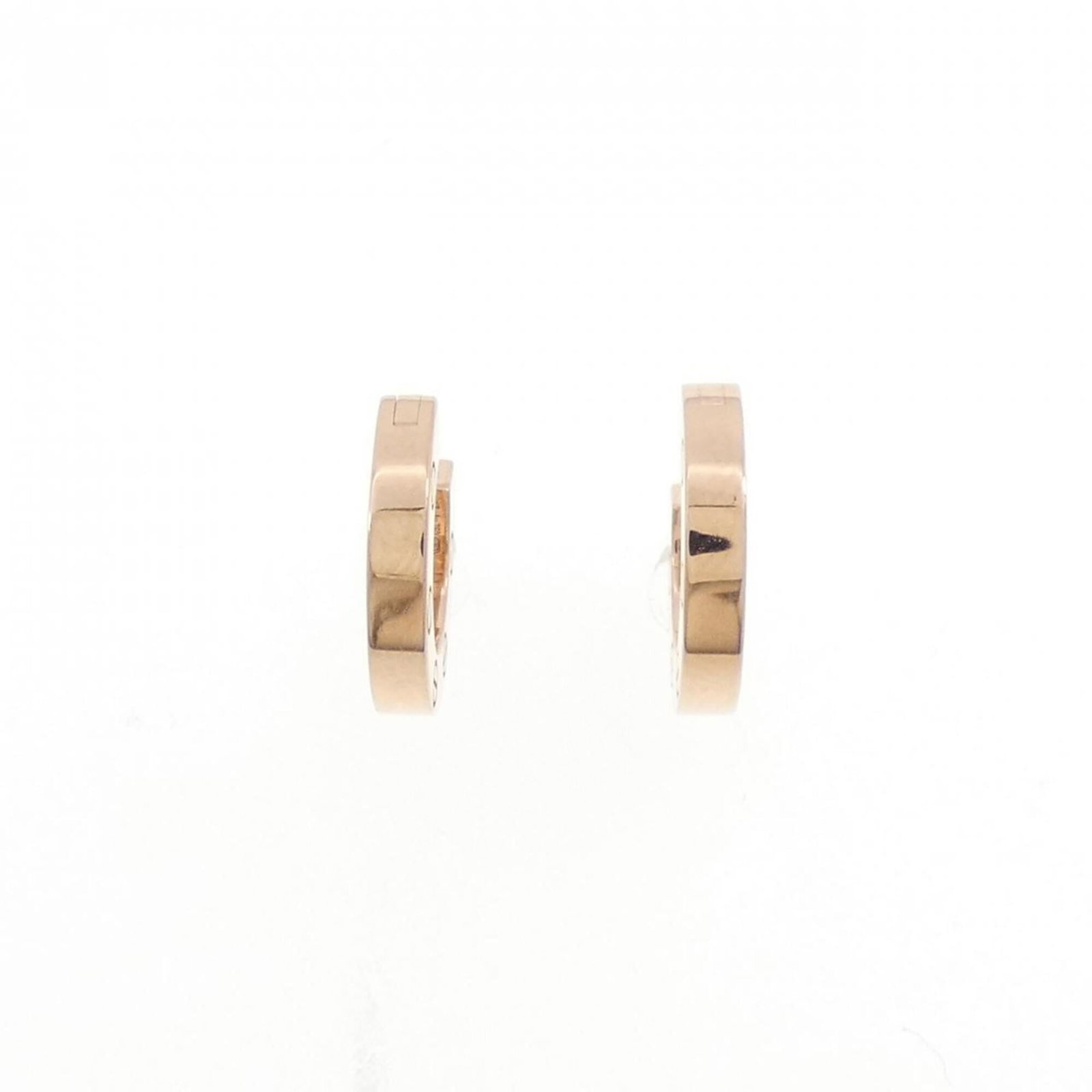 Cartier Stud Earrings Pink Gold (18K): Cartier Stud Earrings Pink Gold (18K) Cartier's iconic stud earrings in pink gold (18K) offer understated elegance. With their subtle size and delicate design, these earrings add a touch of