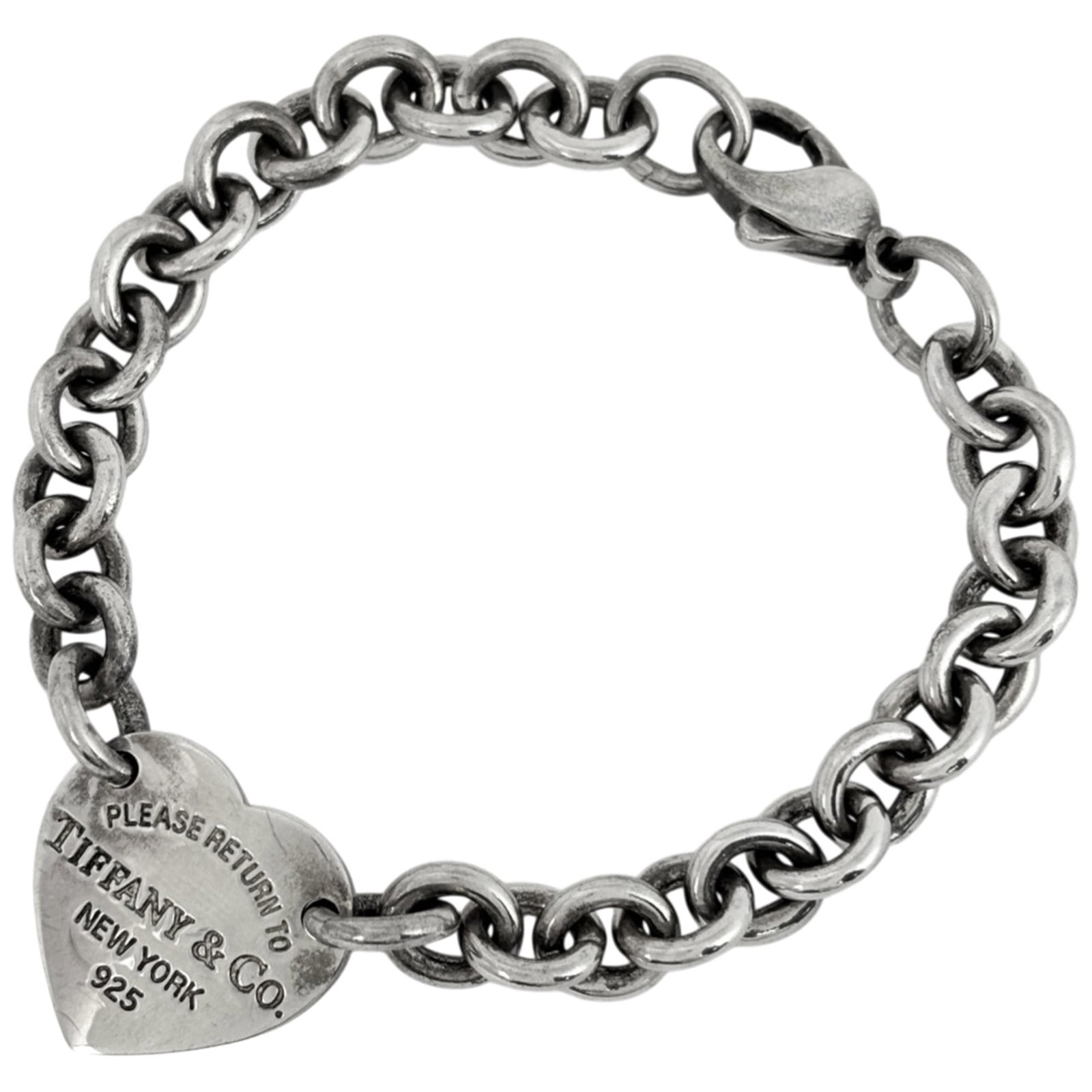 Tiffany Charm Bracelet Silver 925: Tiffany Charm Bracelet Silver 925 Silver 925 Tiffany Charm Bracelet available for purchase. This used charm bracelet features silver 925 material and measures 19cm in length. It is in acceptable condi