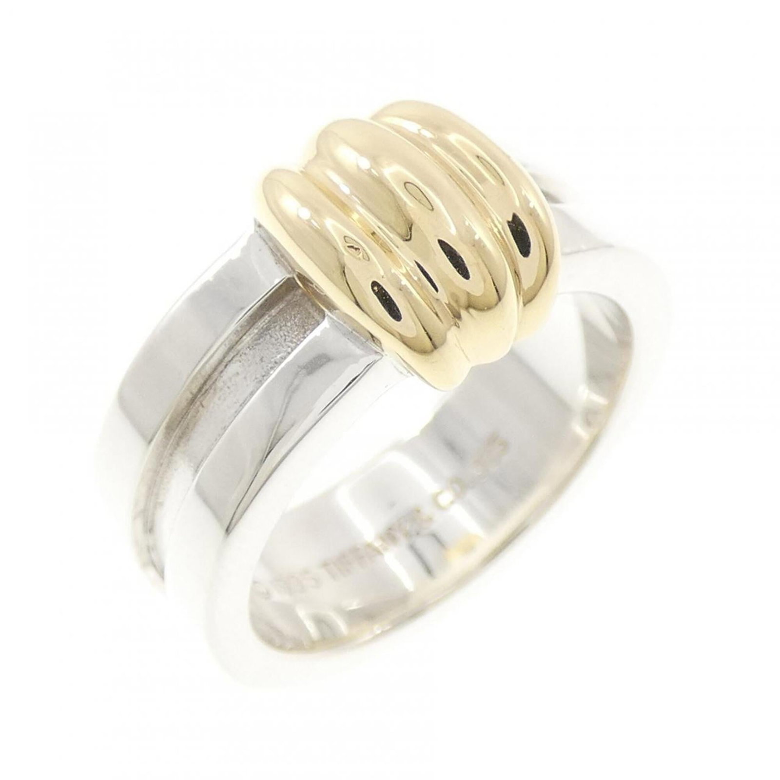 Tiffany Band Ring Silver 925, Yellow Gold (18K): Tiffany Band Ring Silver 925, Yellow Gold (18K) Silver band ring with yellow gold accents from Tiffany, featuring 18K yellow gold details on a silver 925 base. The ring shows some signs of usage,
