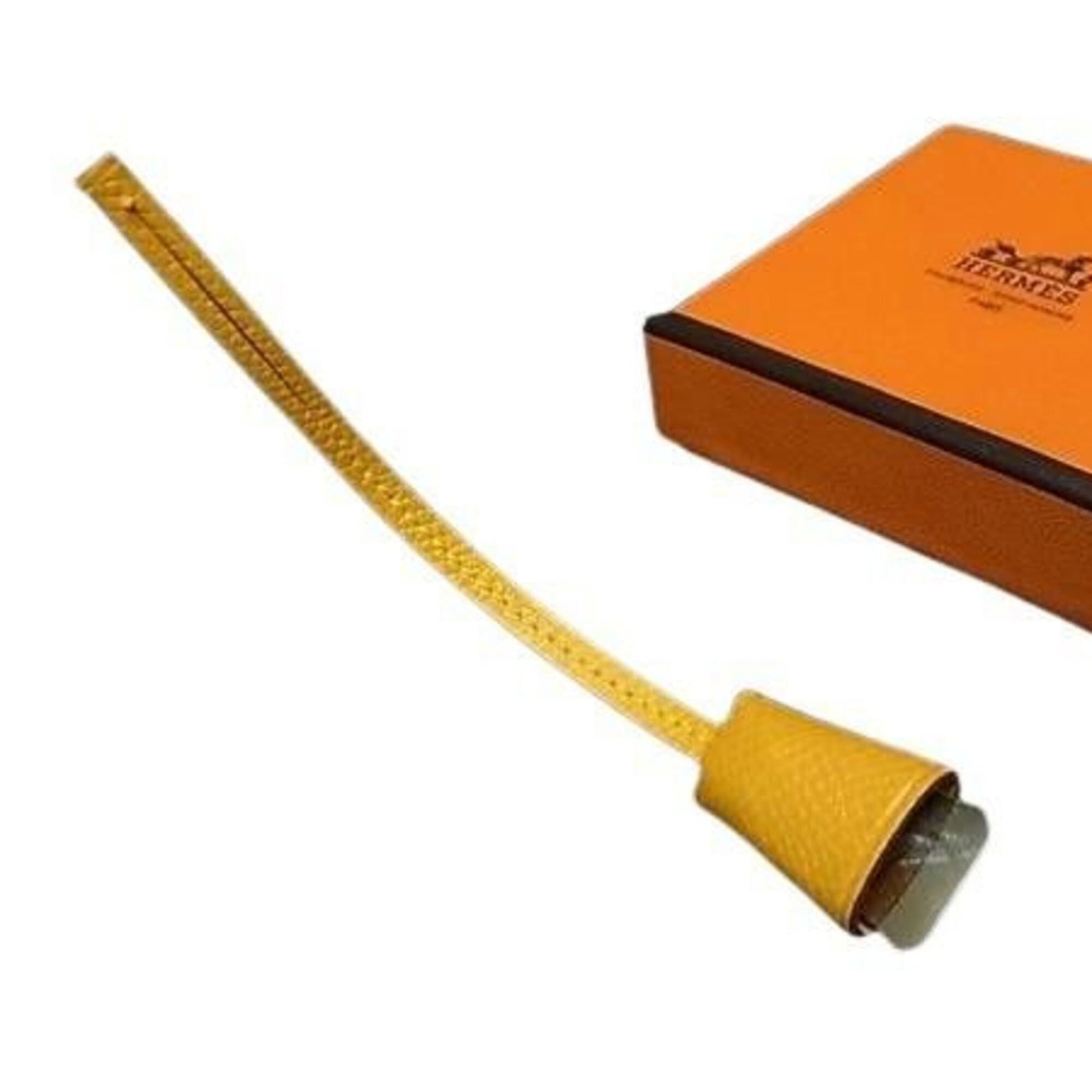 Hermes Handbag Charm Leather: Hermes Handbag Charm Leather Yellow Hermes Handbag Charm Leather. Made from high-quality leather, this charm features a distinctive yellow color. Opened and never used, it remains in excellent