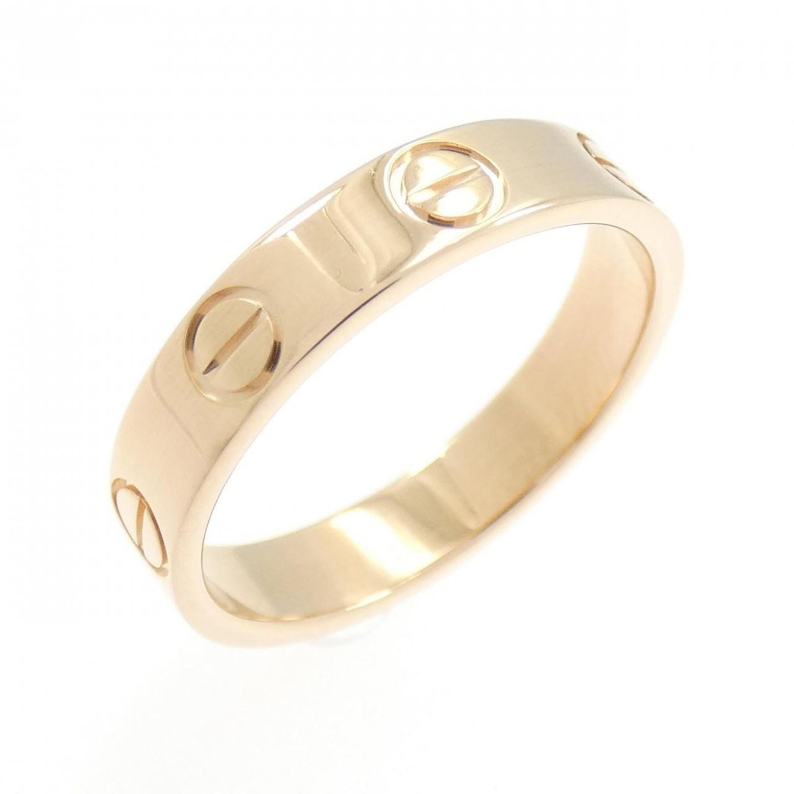 Cartier Band Ring Pink Gold (18K): Cartier Band Ring Pink Gold (18K) Cartier Band Ring in Pink Gold (18K) features a classic design with a few traces of usage, some scratches / dirt visible. The pink gold material gives it a luxurious