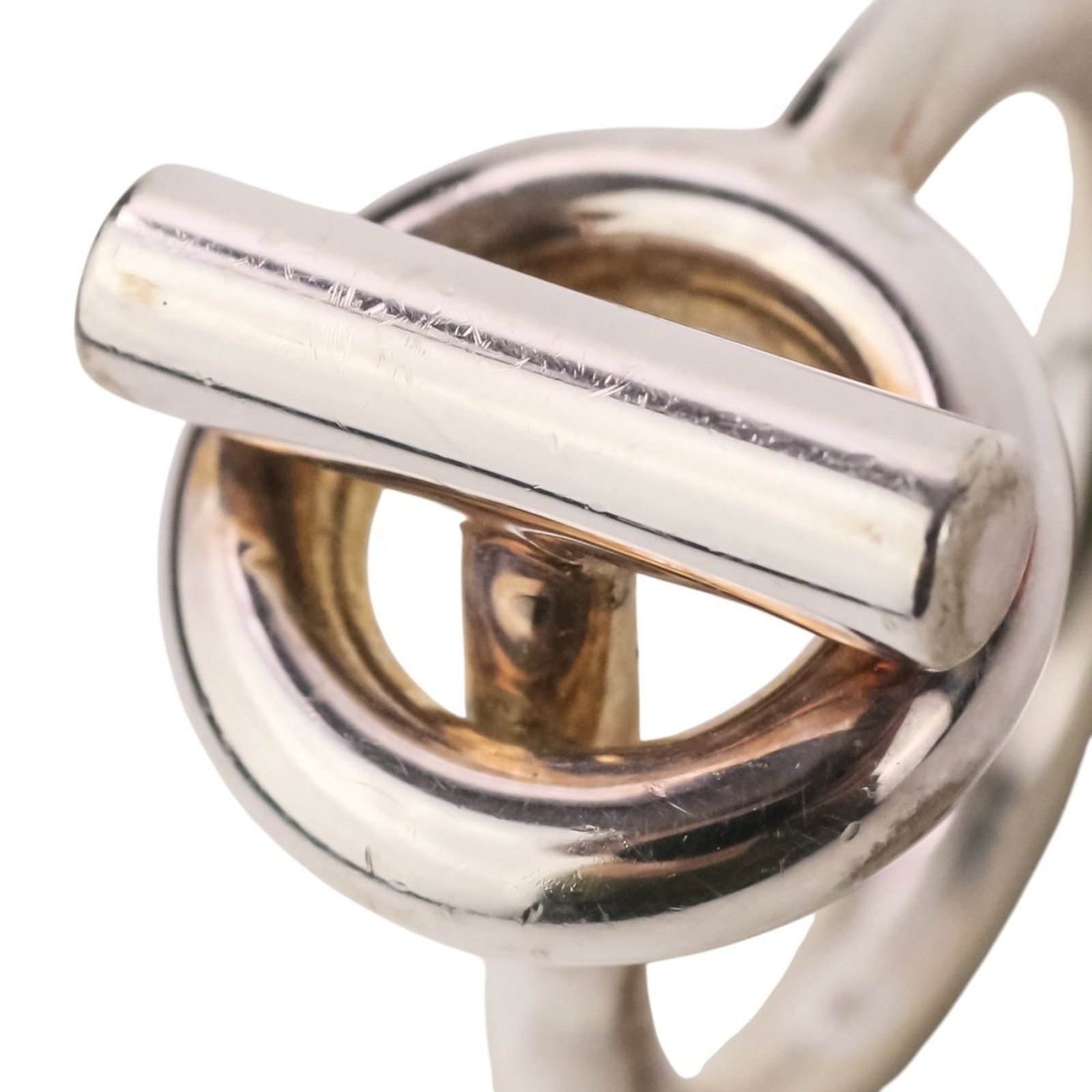 Hermes Band Ring Silver 925: Hermes Band Ring Silver 925 Silver 925 band ring from Hermes, featuring a sleek and modern design. This unisex ring showcases a subtle shine in silver 925 material, with some minor scratches and trace