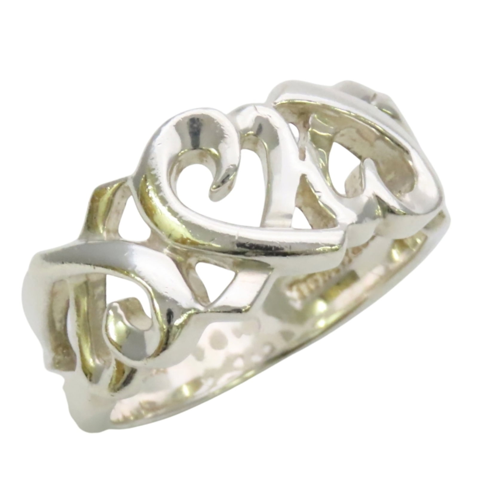 Tiffany Band Ring Silver 925: Tiffany Band Ring Silver 925 Silver band ring from Tiffany featuring 925 sterling silver material, available in women's size 5.5 with traces of usage and minor scratches. The ring has been used and sh